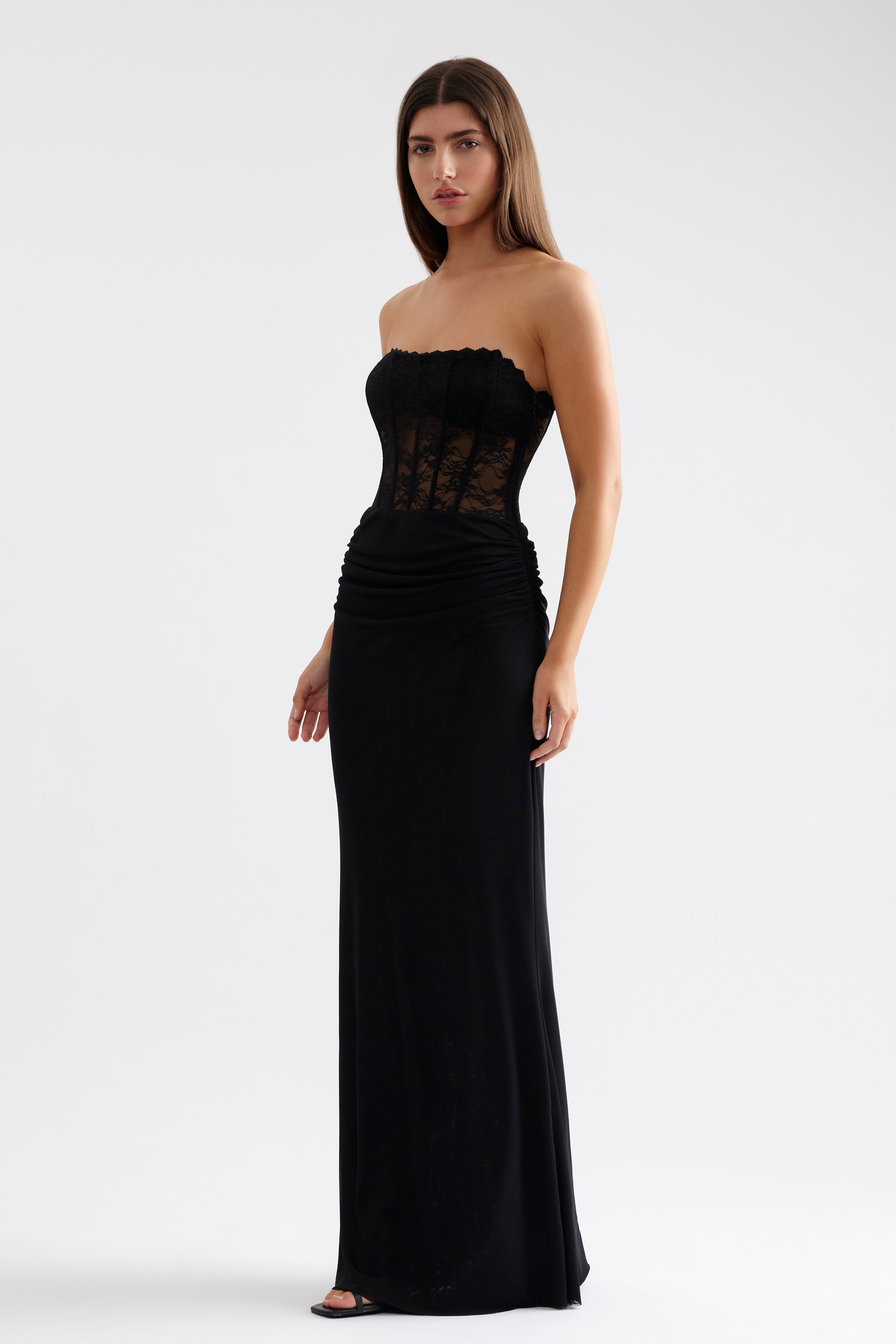 Alla Dress strapless gown with sheer lace bodice and ruched waist detail in black for formal and cocktail occasions by Studio Lexi