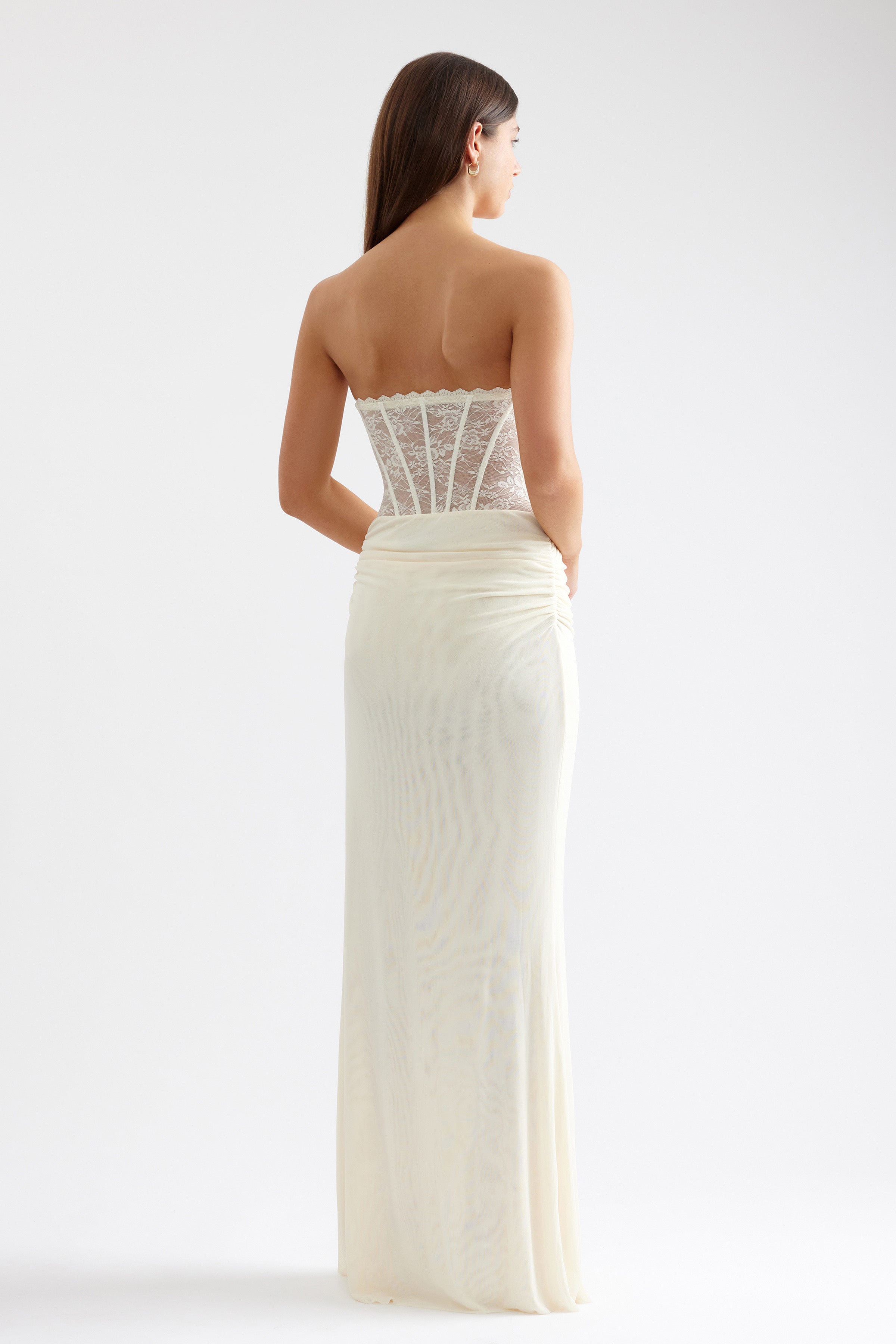 Alla Dress strapless gown with sheer lace corset back and ruched skirt in butter cream for formal and black tie events by Studio Lexi
