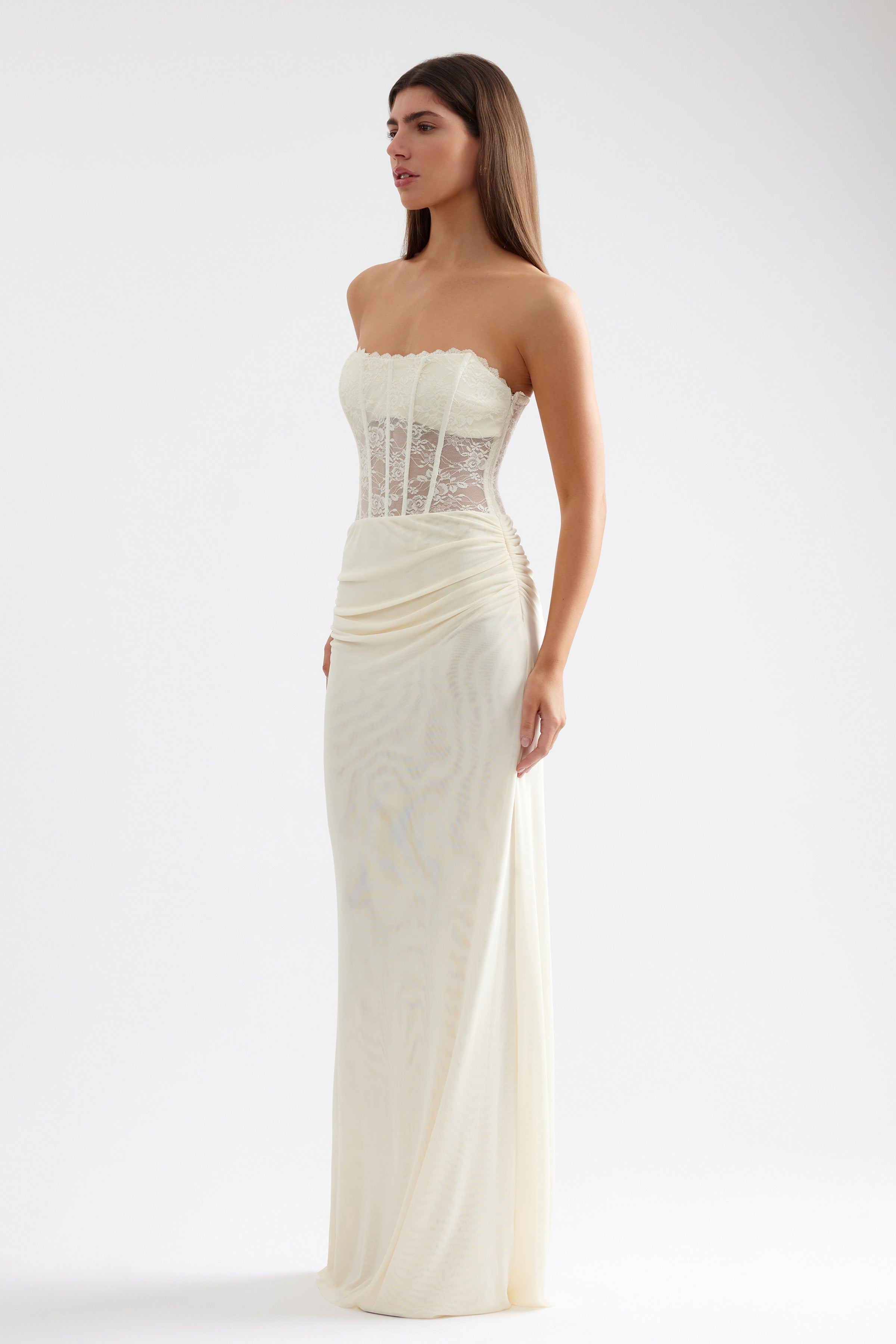 Alla Dress strapless gown with sheer lace corset bodice and ruched skirt in butter cream for formal and black tie by Studio Lexi