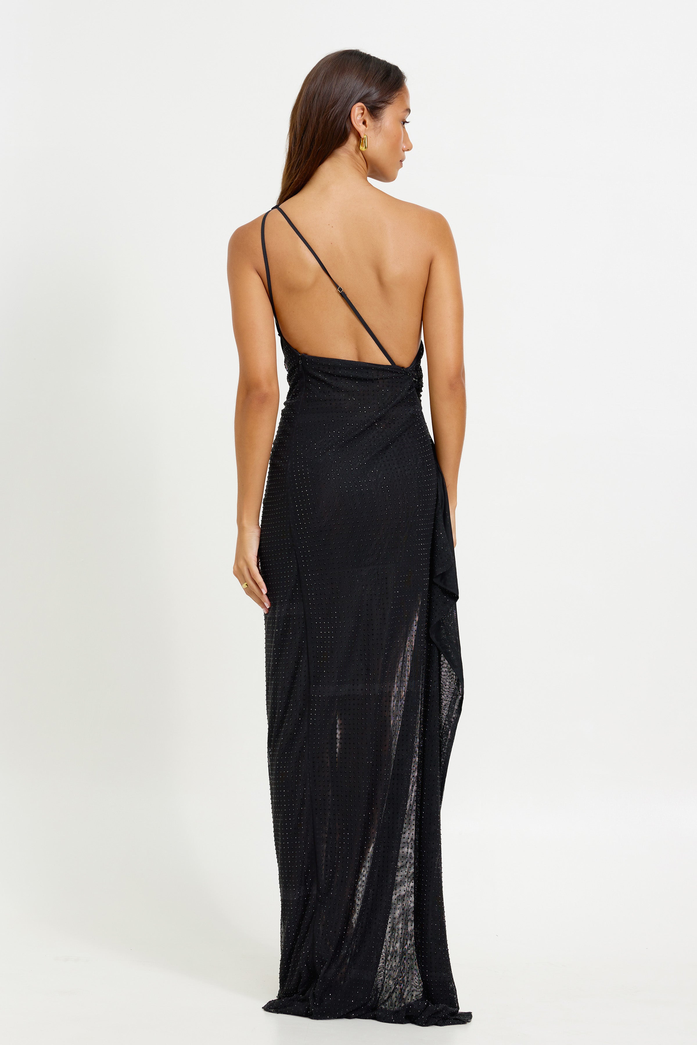 Amara Dress featuring a black backless design with thin straps, small train, and elegant formal occasion style