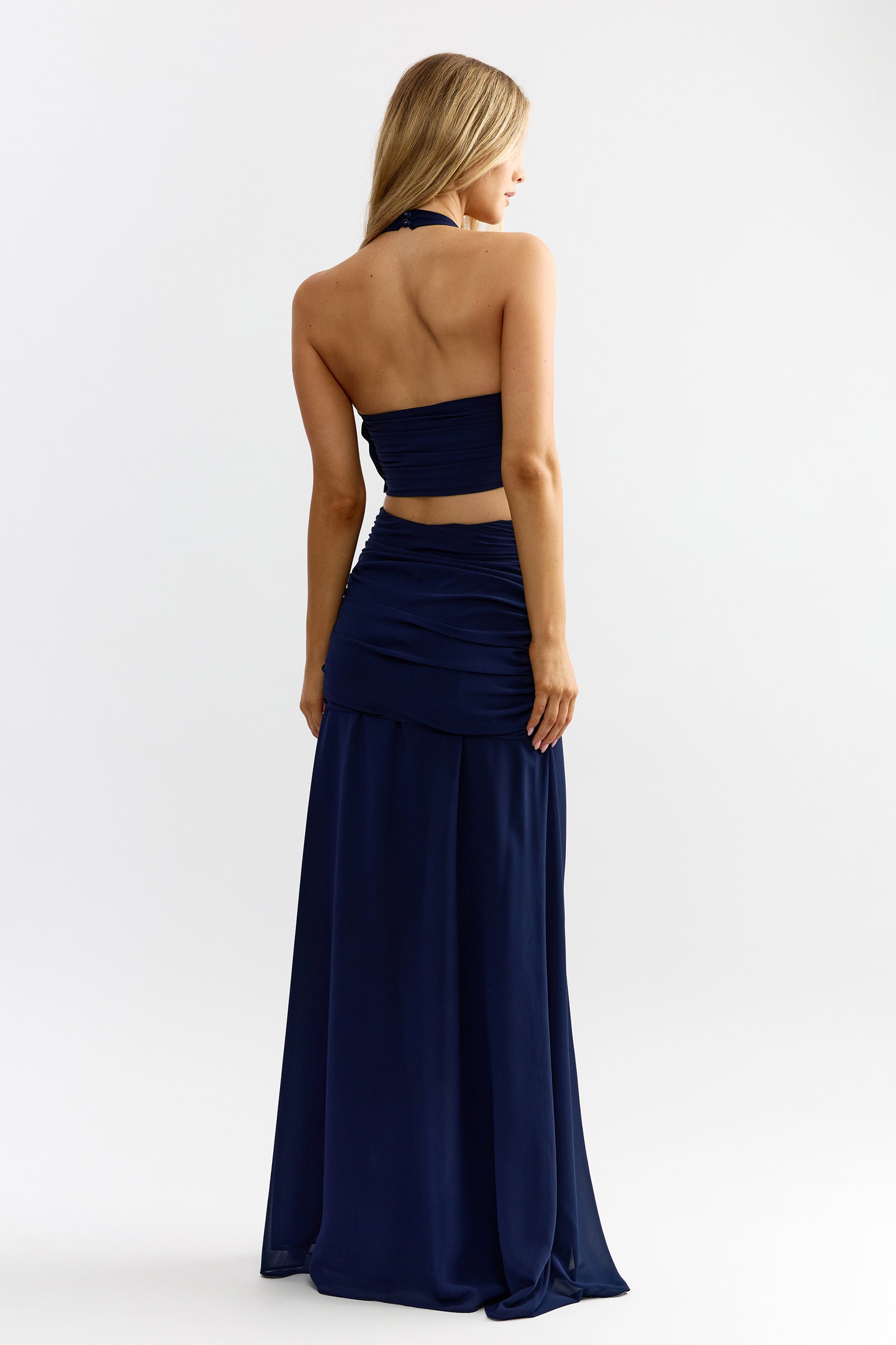 Andre Set featuring an open back and ruched detailing in midnight blue for formal cocktail and wedding guest occasions by Studio Lexi