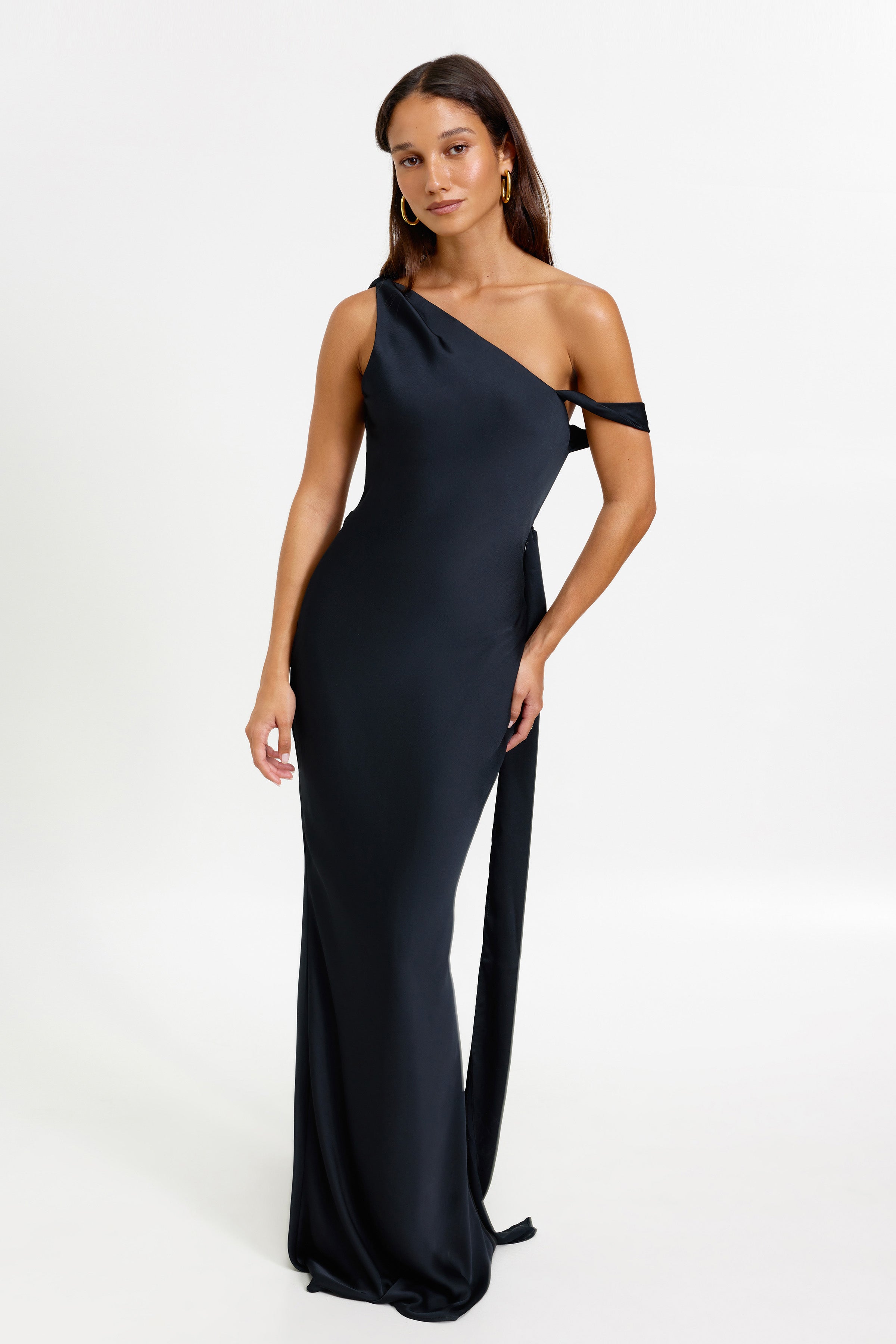 Ara Dress one-shoulder silhouette with asymmetric sleeve and draped detail in elegant black satin for formal occasions