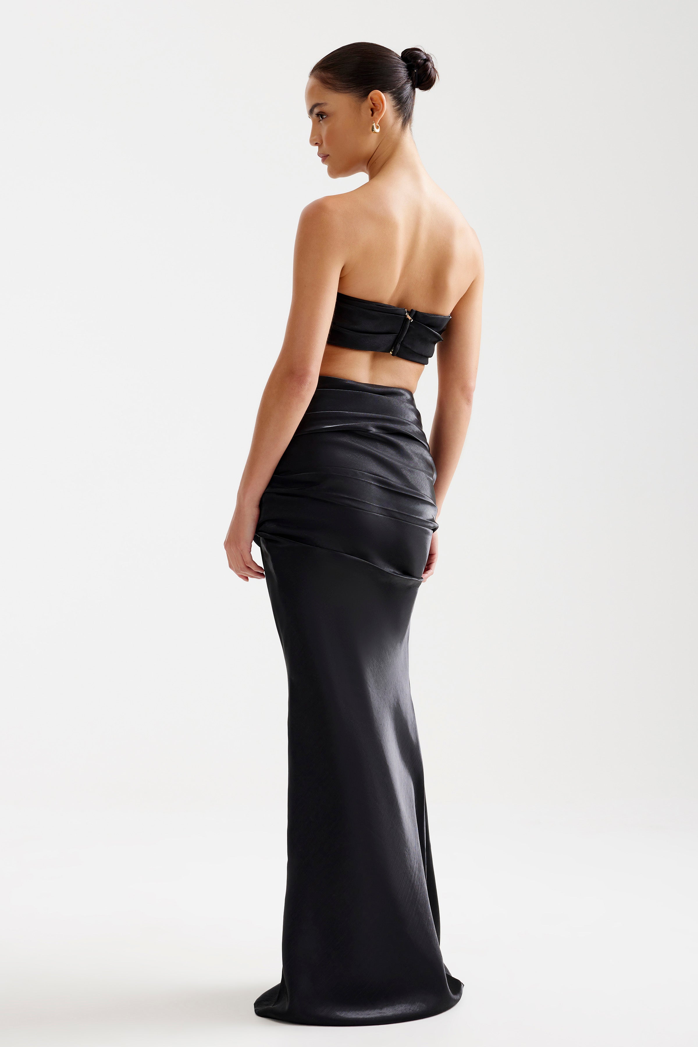 Ariana Set featuring a strapless bra-friendly design with ruched detailing in black for formal and cocktail occasions by Studio Lexi