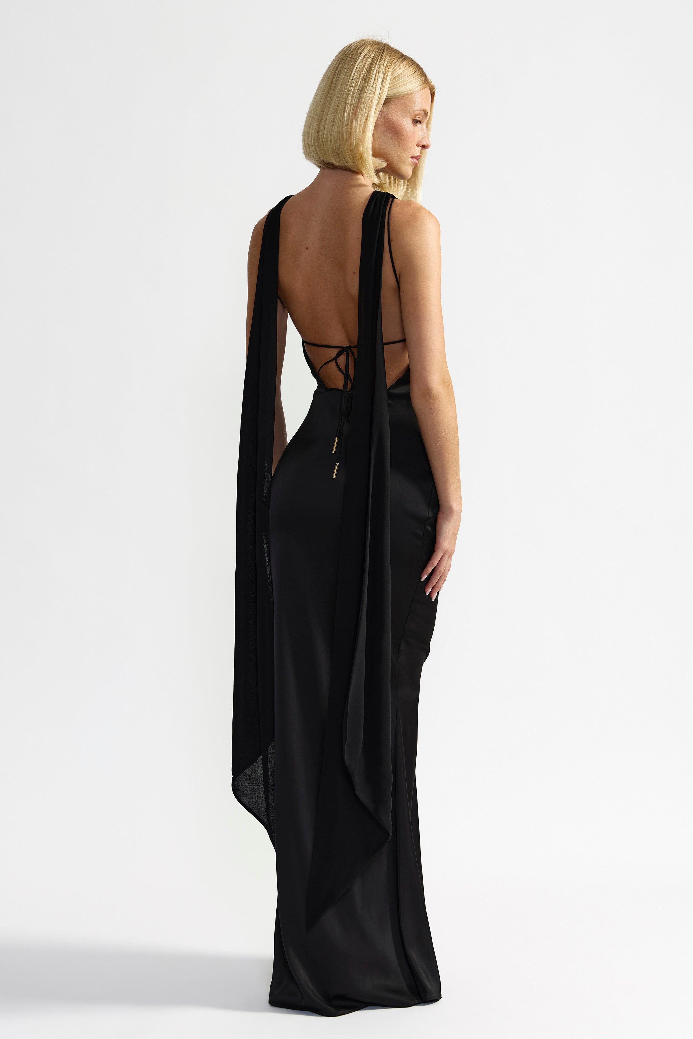 Audrey Dress elegant backless design with flowing draped straps and fitted silhouette in black for formal occasions by Studio Lexi