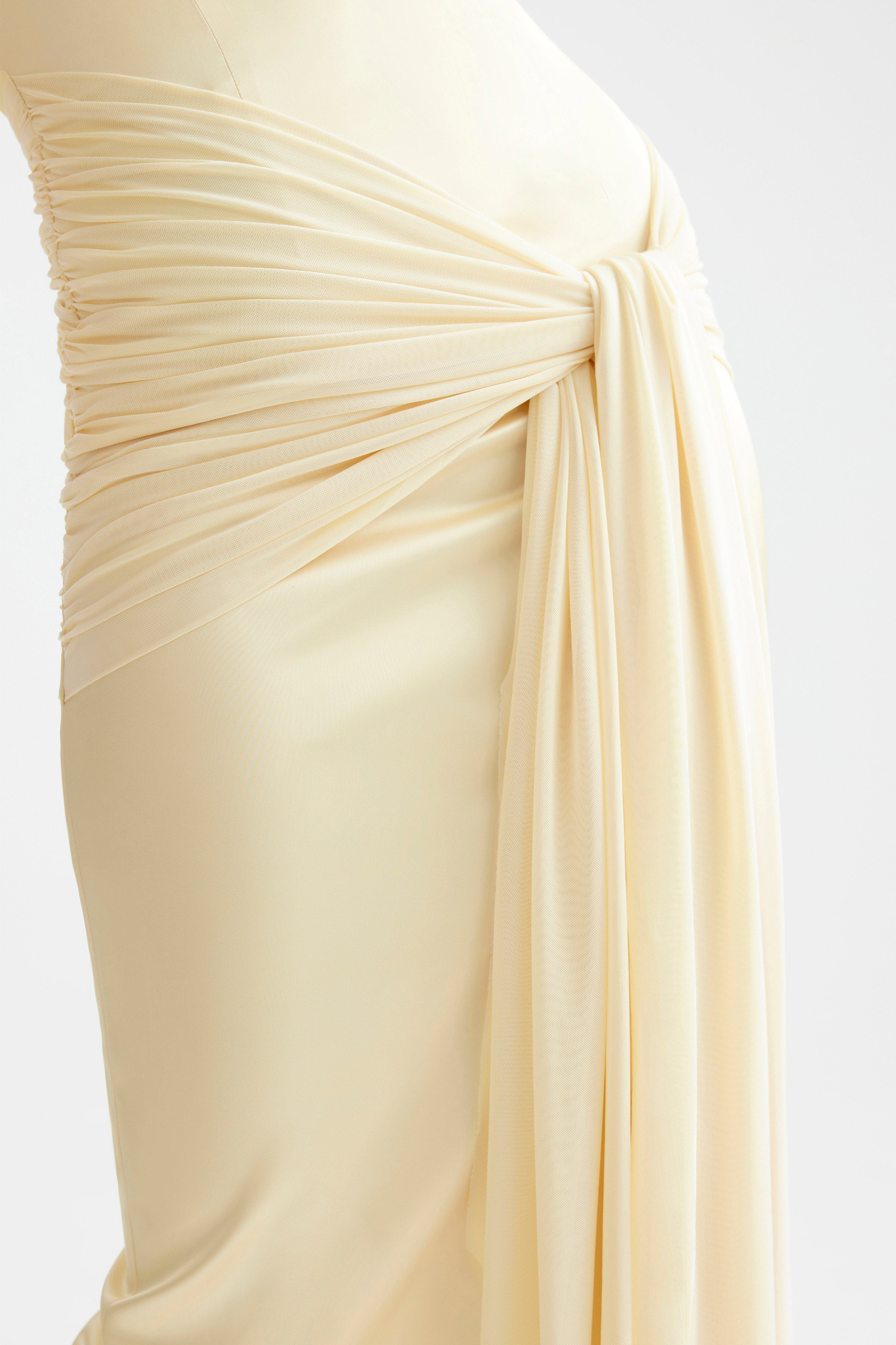 Ayla Dress featuring a gathered wrap detail and soft draping in limoncello for elegant formal occasions
