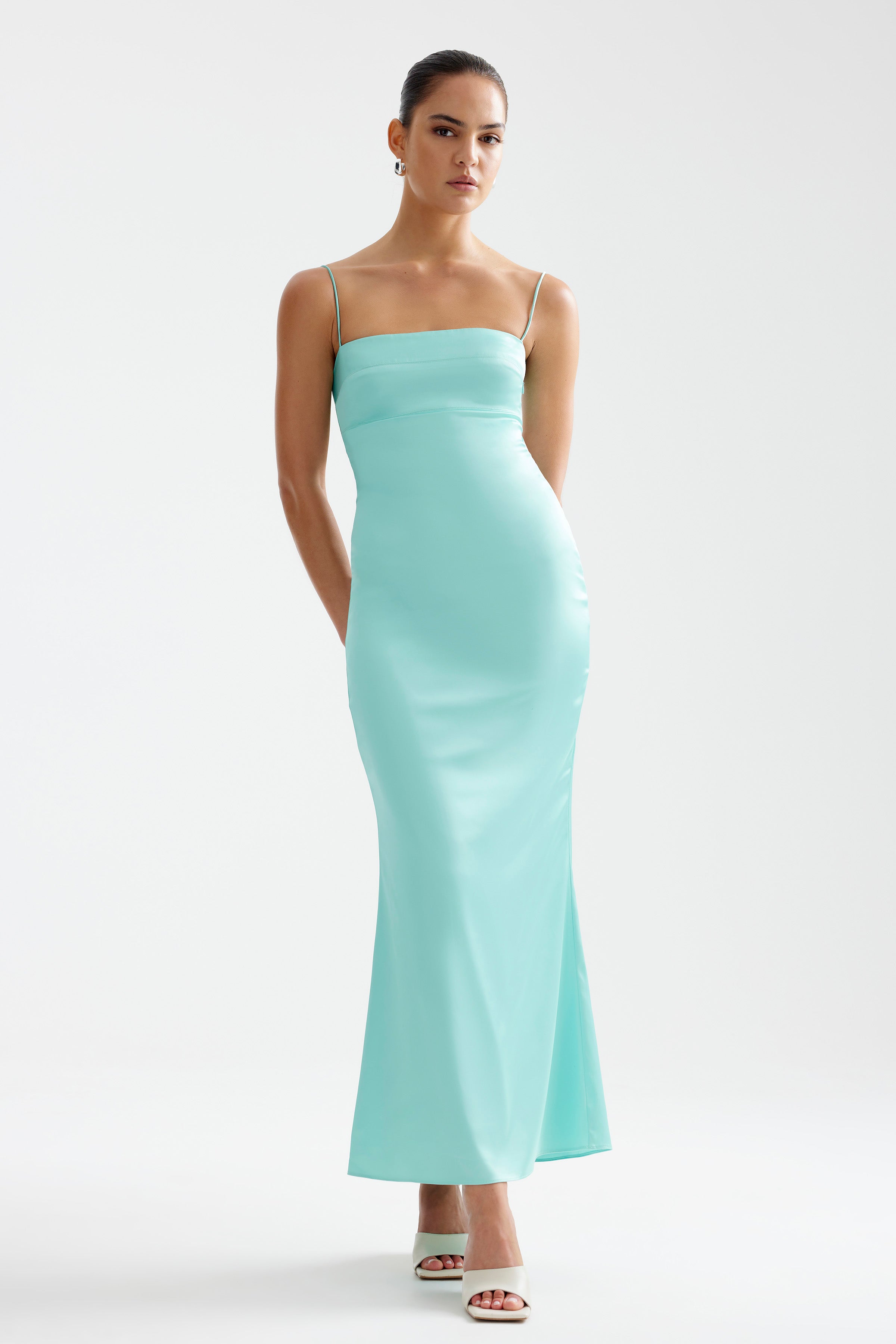 Bora Dress featuring a fitted silhouette with thin straps in aqua for formal and cocktail occasions by Studio Lexi