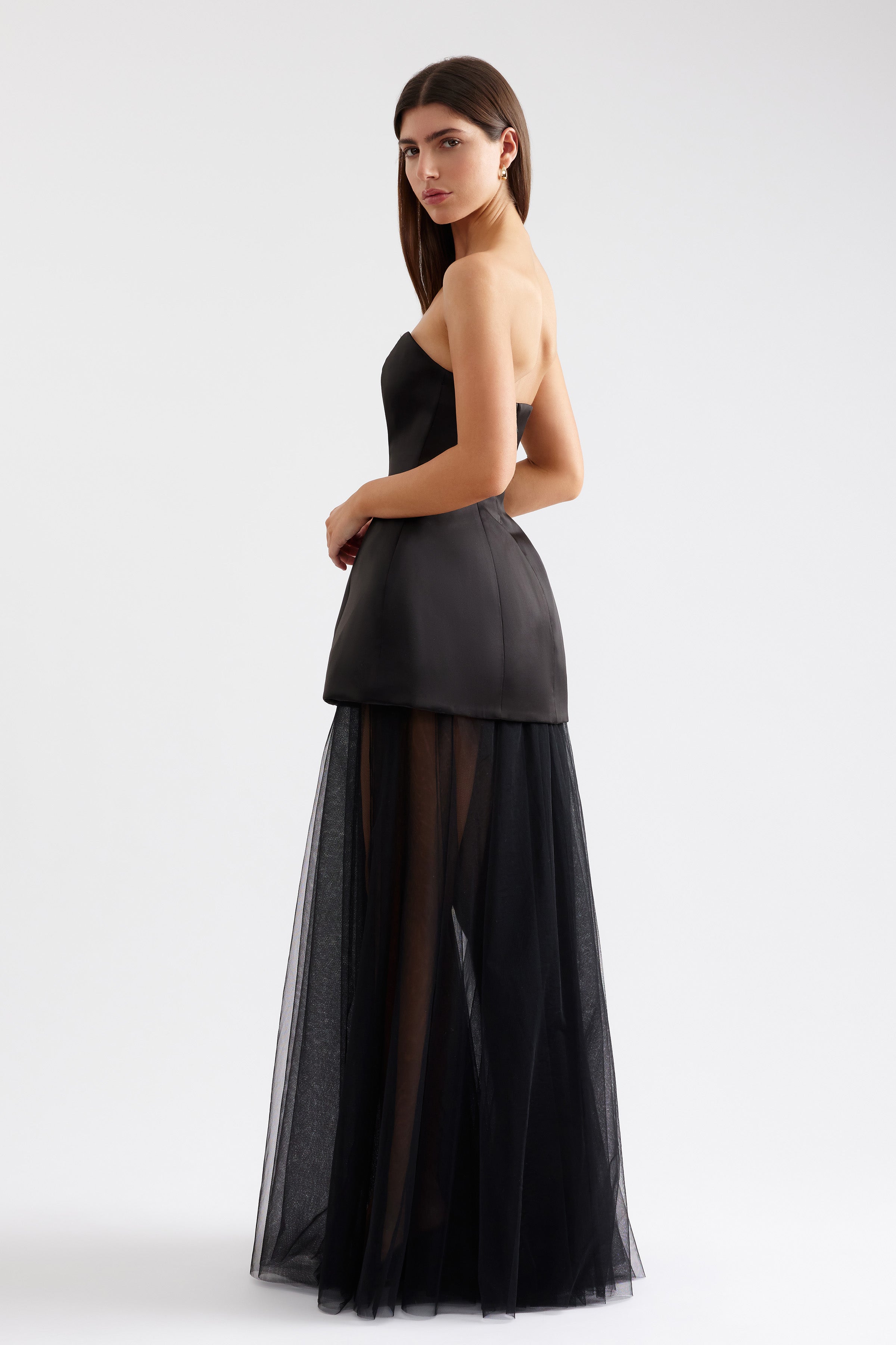 Brigitte Dress strapless silhouette with a fitted bodice and sheer black tulle skirt designed for formal black tie occasions