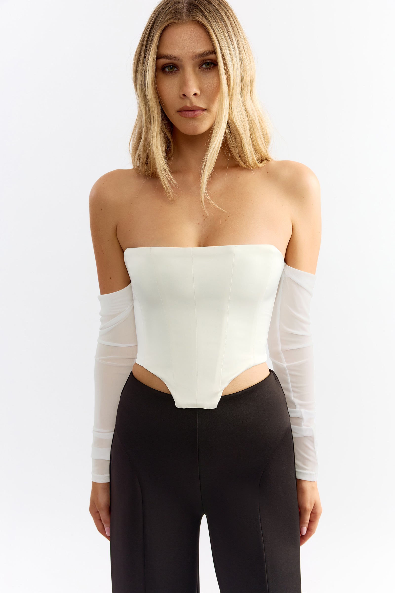 Cameron Top featuring strapless corset design with sheer long sleeves in ivory for stylish party wear by Studio Lexi