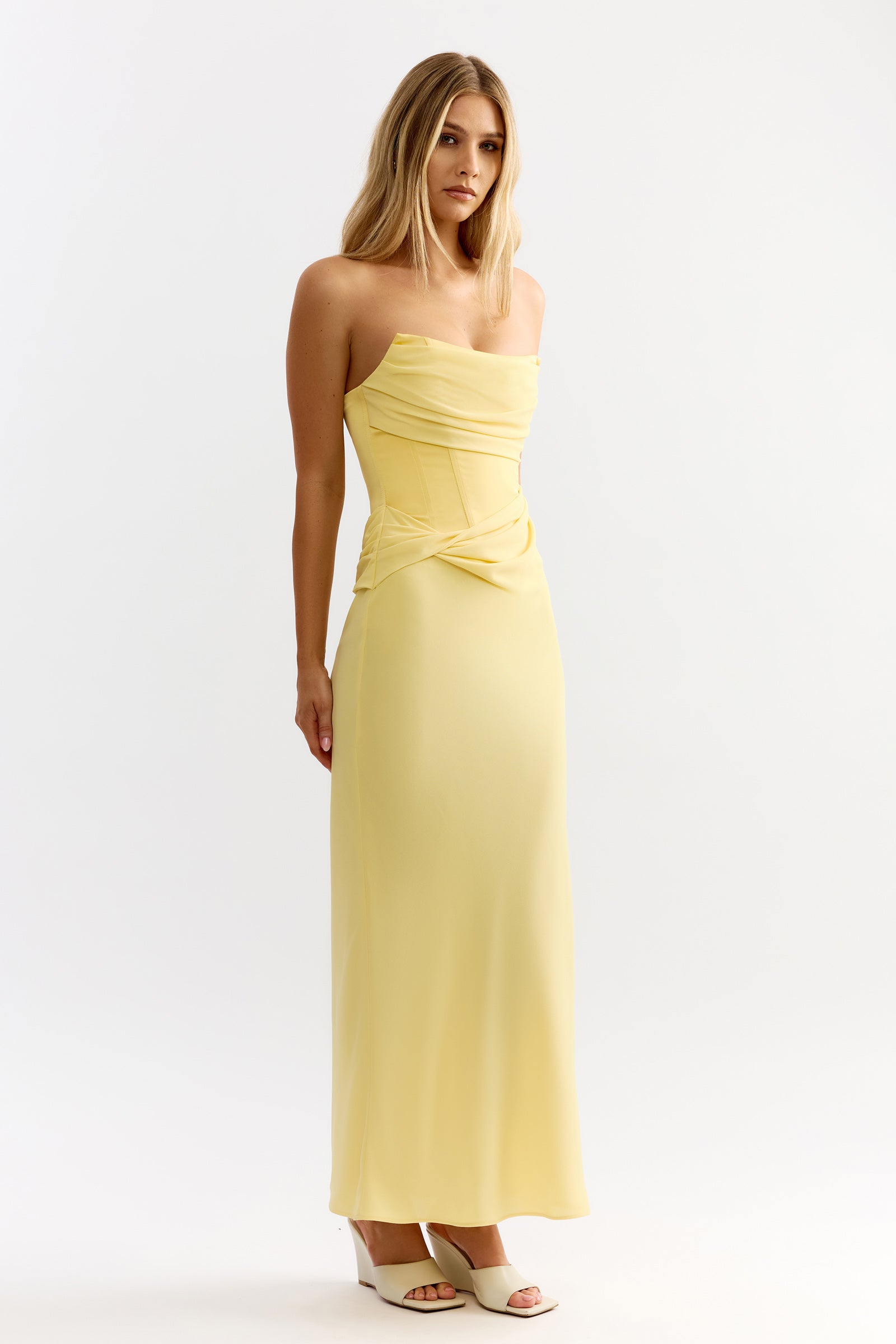 Cassie Dress stretch fabric with strapless neckline and draped waist in soft sunflower yellow by Studio Lexi