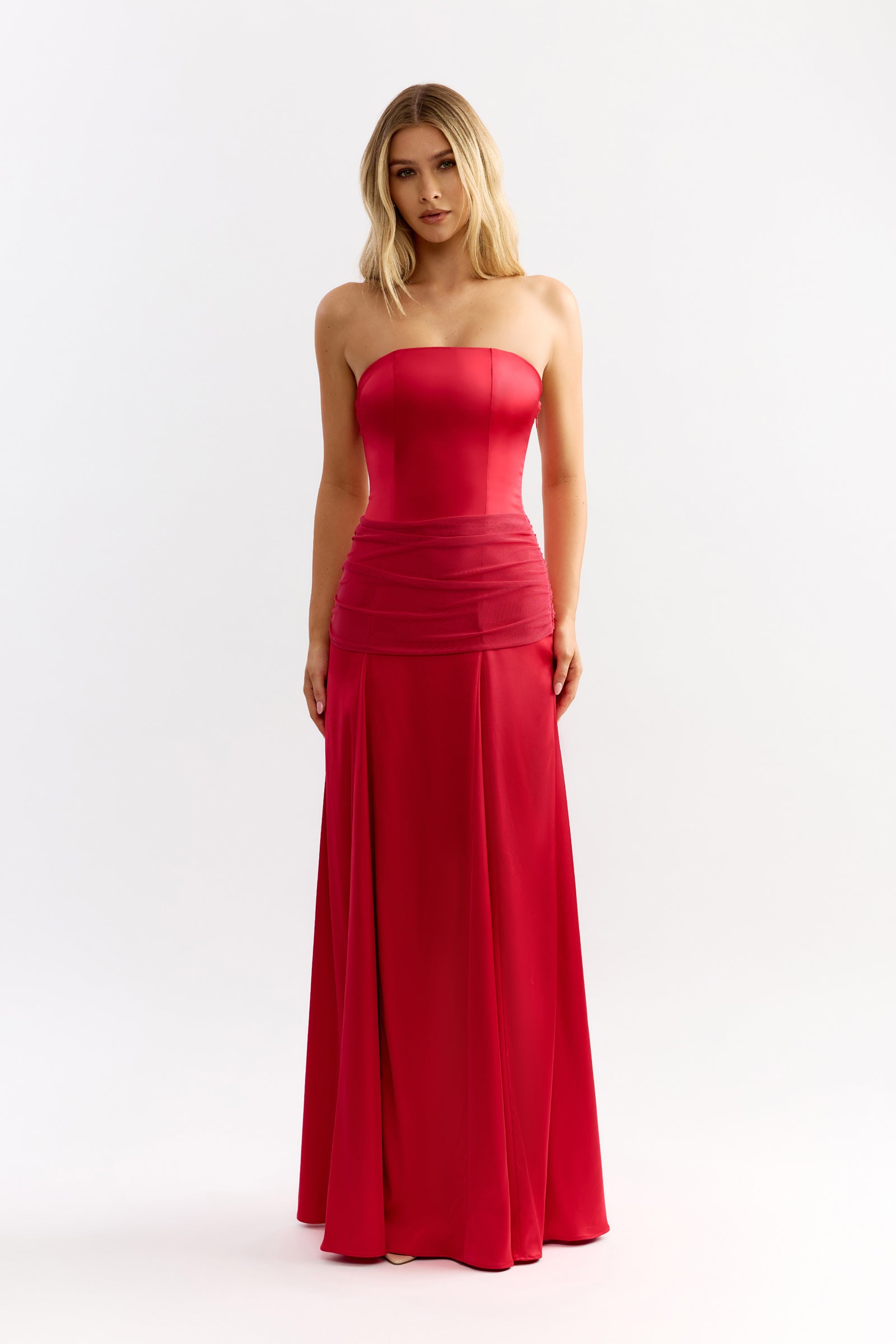 Celine Dress strapless silhouette with ruched waist detail and flowing skirt in rich raspberry by Studio Lexi for formal occasions