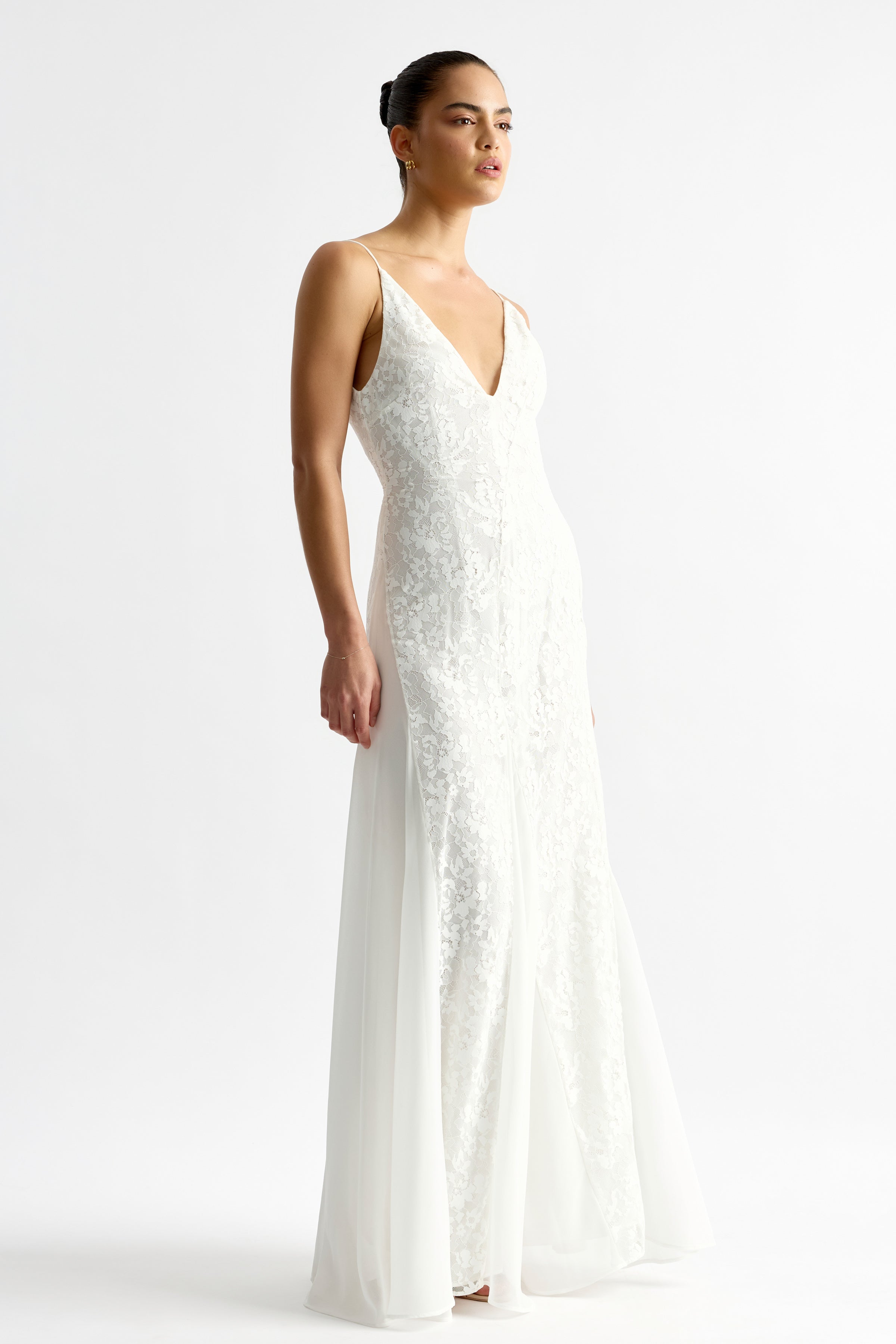 Corina Dress with fitted lace bodice, flowing skirt, and thin straps in white for elegant formal wear by Studio Lexi