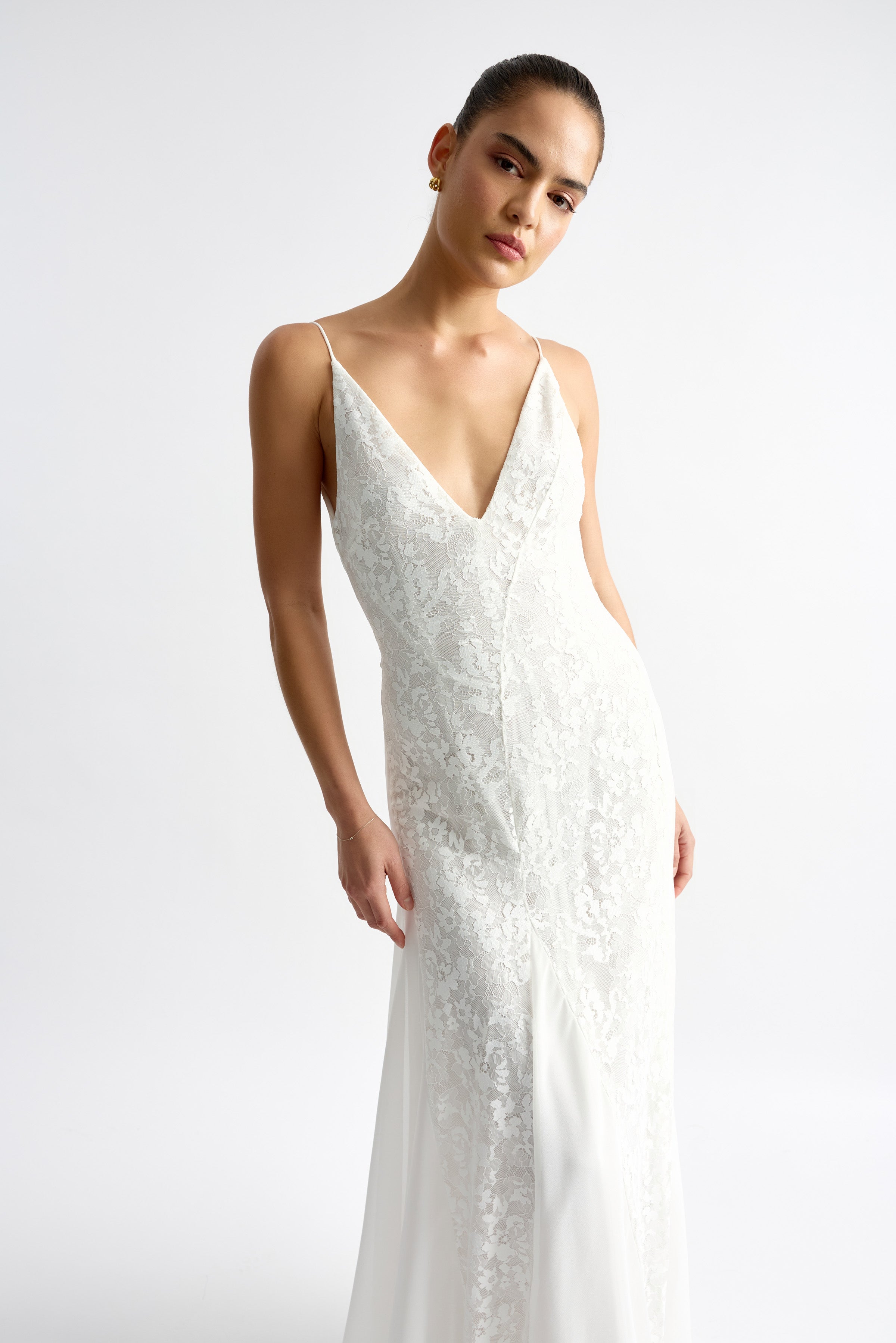 Corina Dress featuring a sleek fitted design with delicate lace and thin straps in white for formal occasions by Studio Lexi