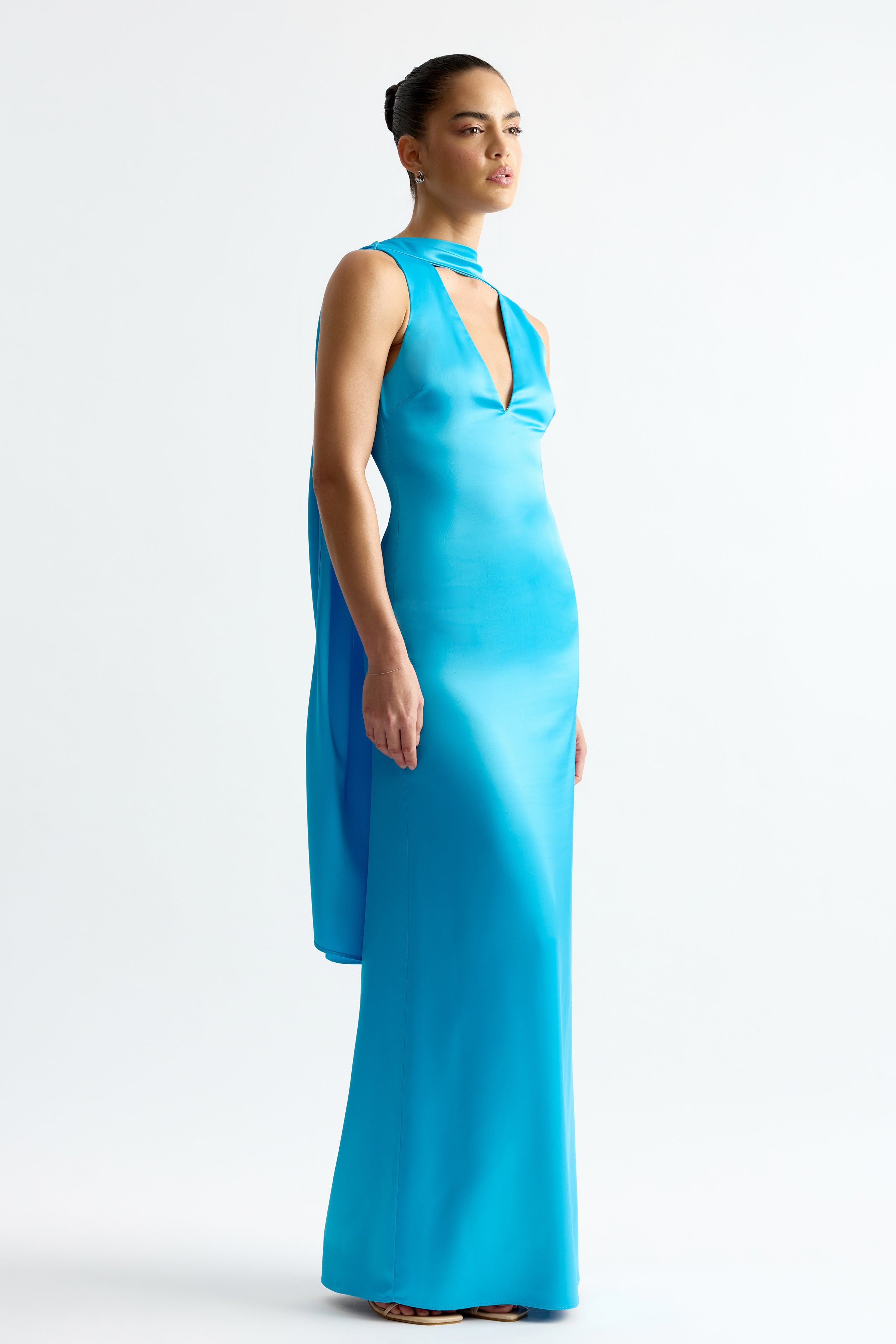 Eloise Dress featuring a sleek silhouette with keyhole neckline and draped back detail in capri blue by Studio Lexi