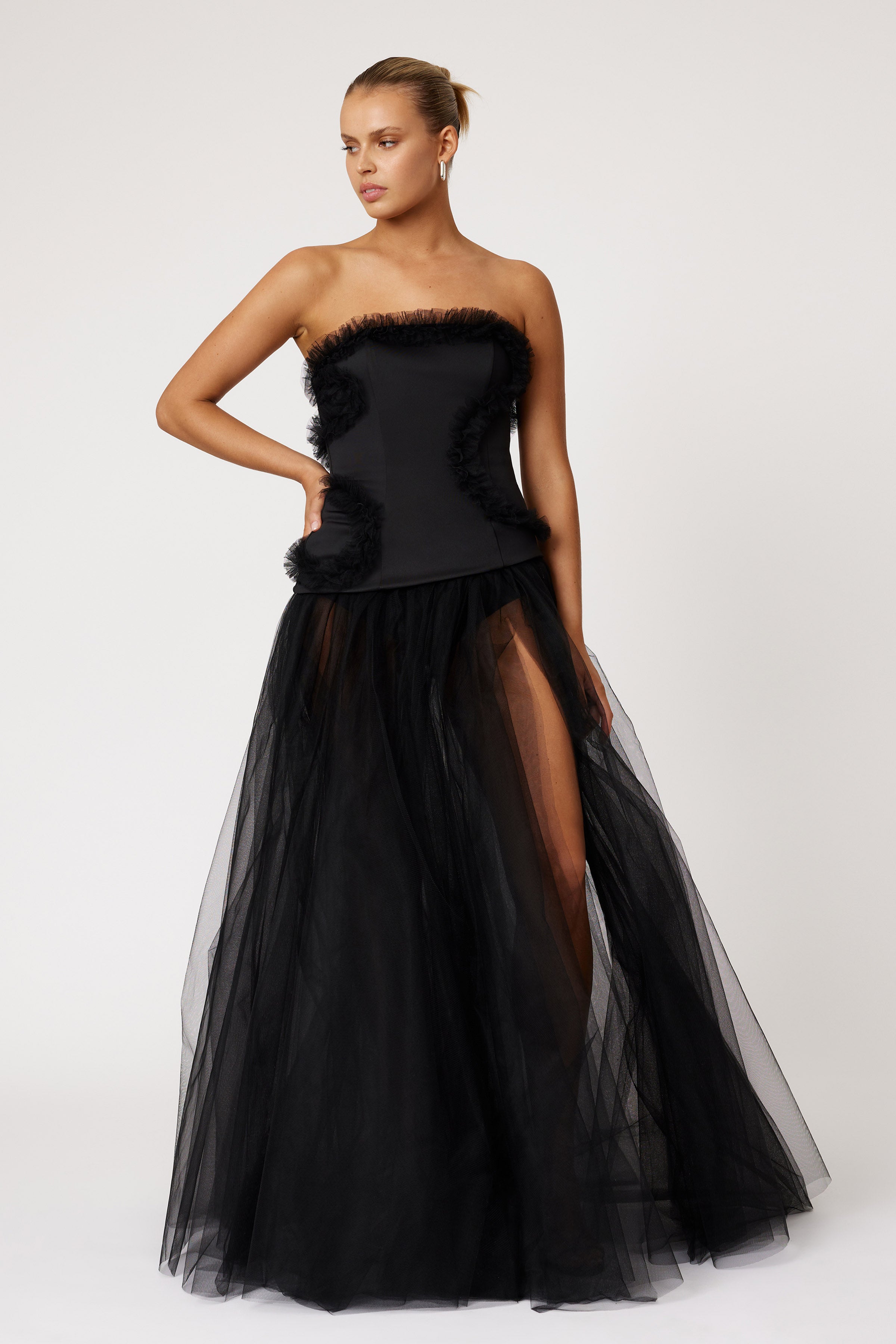 Emilie Dress strapless design with sheer layered skirt, high side split and textured trim in black for formal and black tie by Studio Lexi