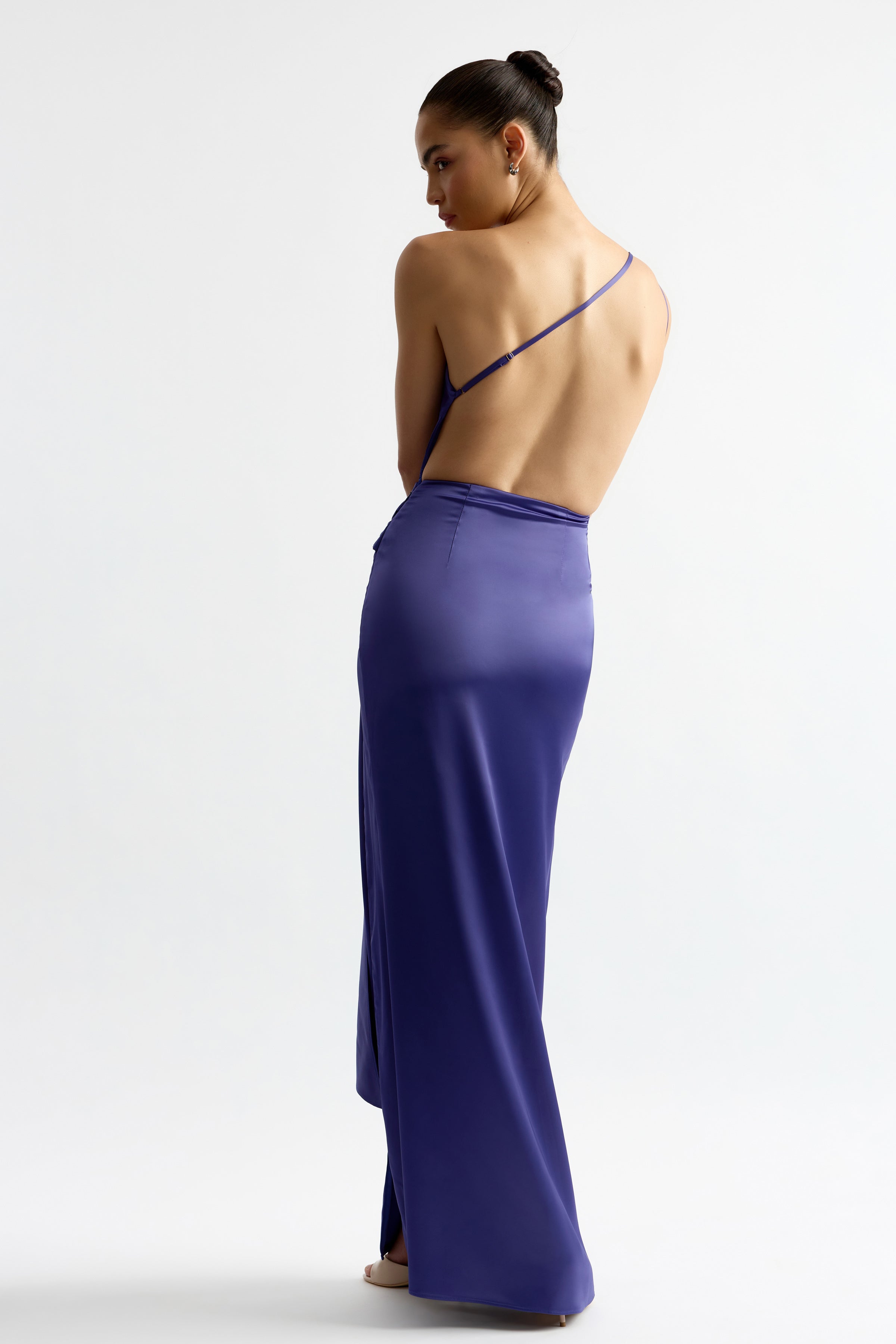 Fabienne Dress featuring a backless design and single strap in indigo satin for elegant evening occasion wear by Studio Lexi