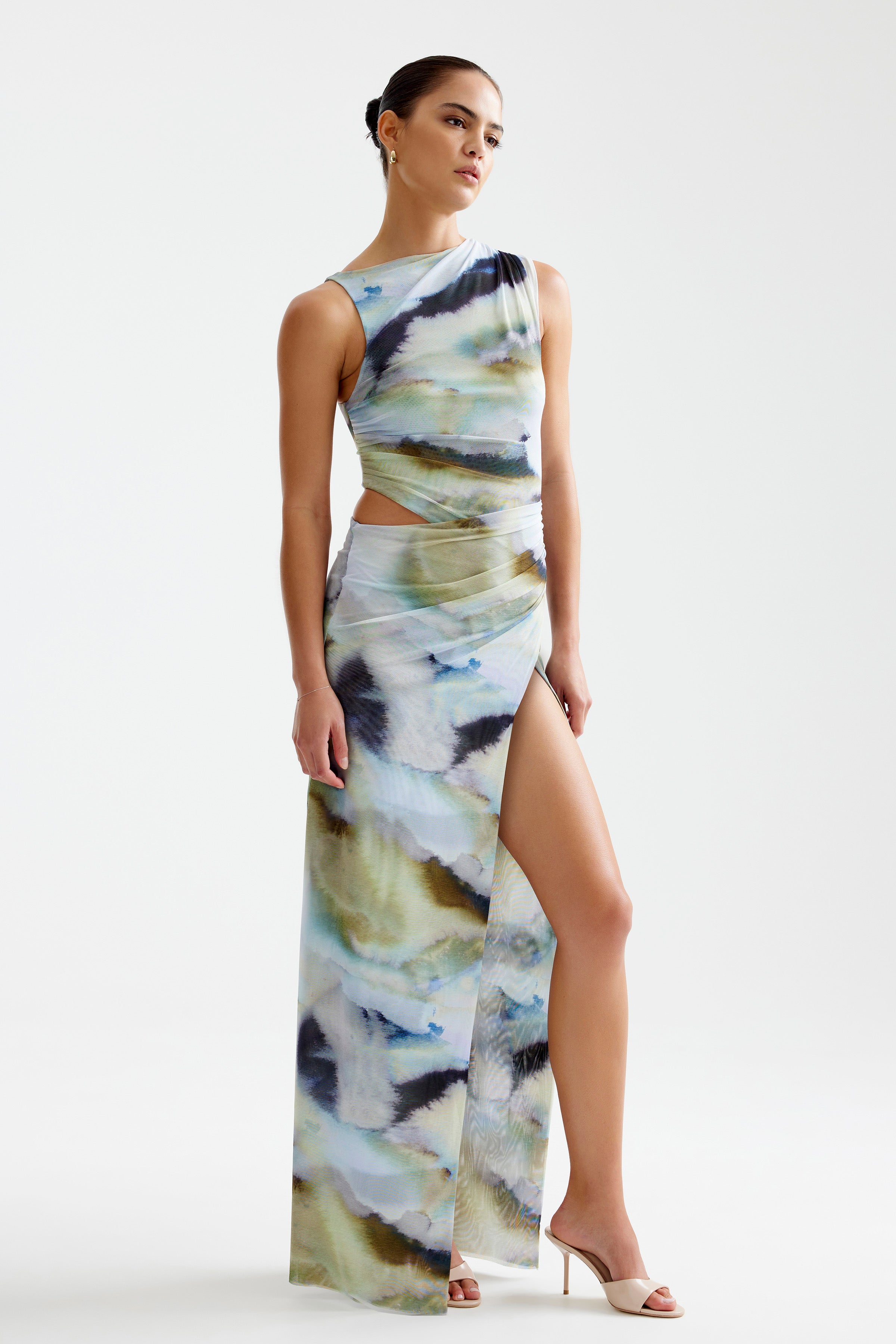 Fiora Dress featuring a sleeveless fit with side cutouts and high leg split in blue mineral print by Studio Lexi