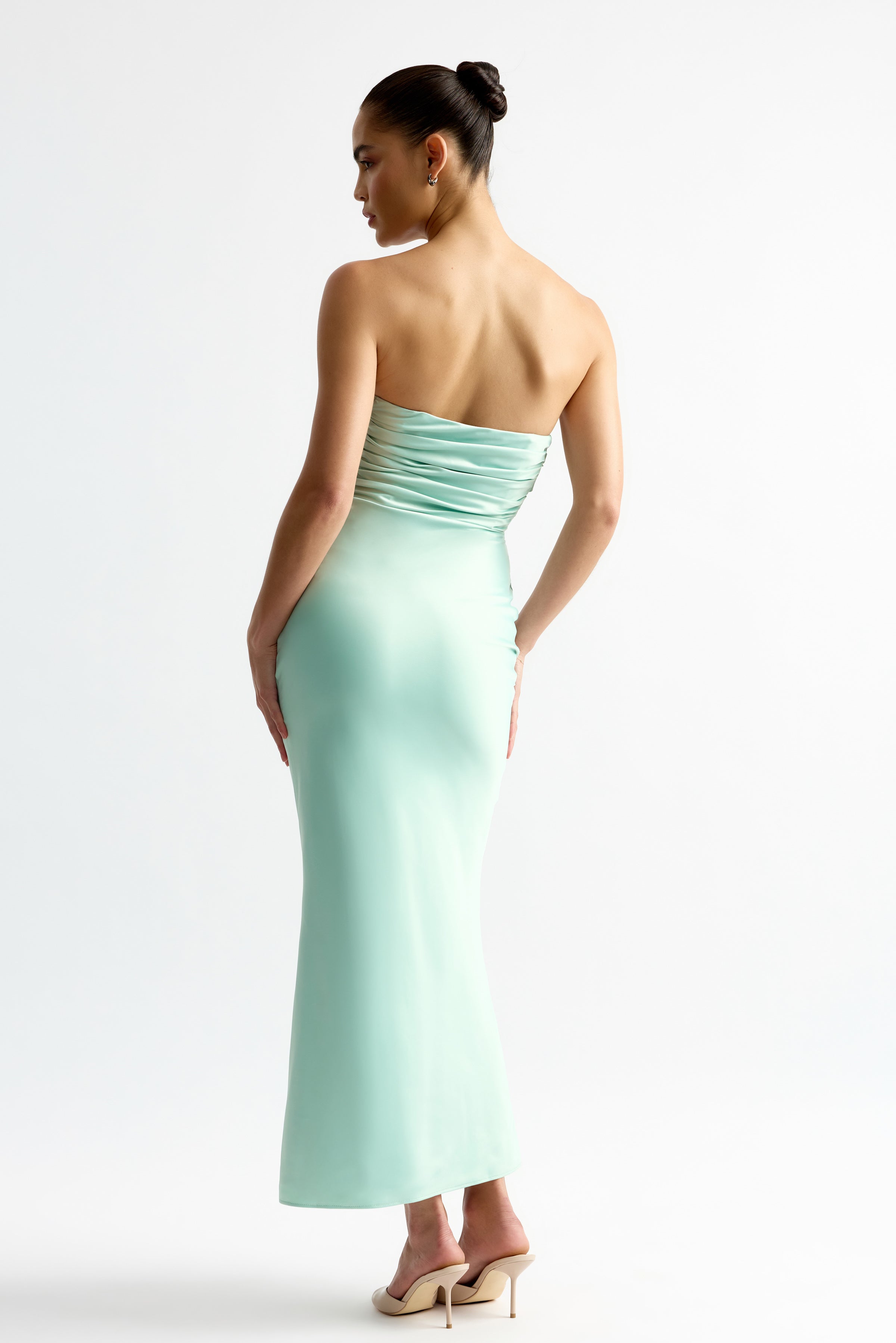 Geneva Dress strapless backless design with ruched detailing in soft mint for elegant occasion wear by Studio Lexi