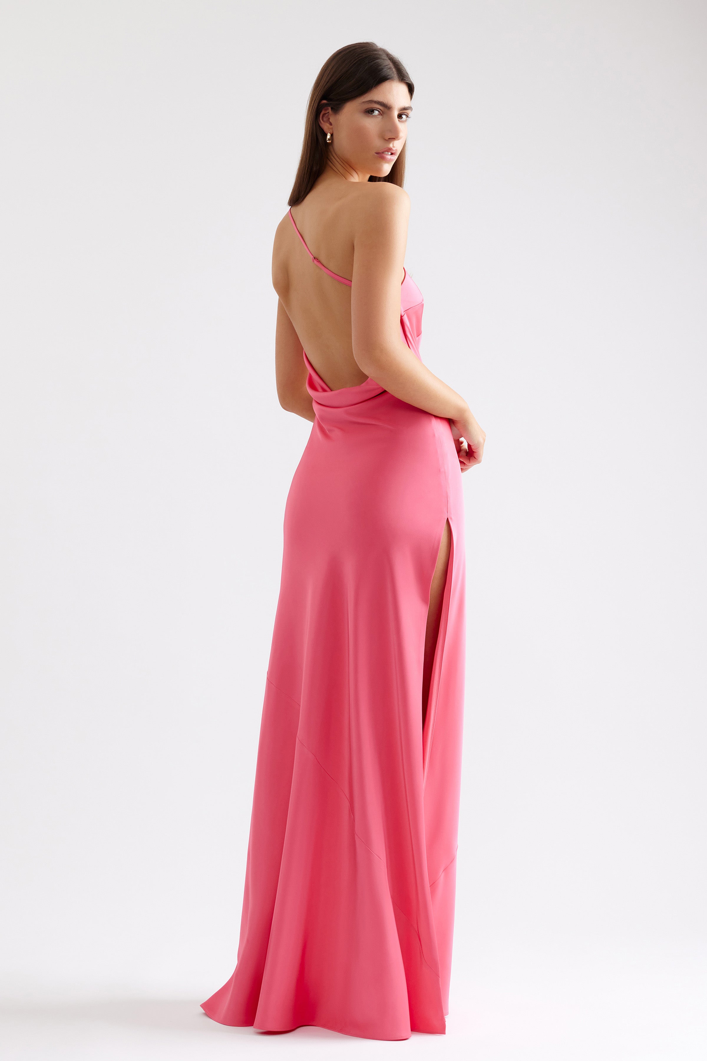 Gina Dress backless design with slim fit and high side split in vibrant deep pink for formal and black tie events by Studio Lexi