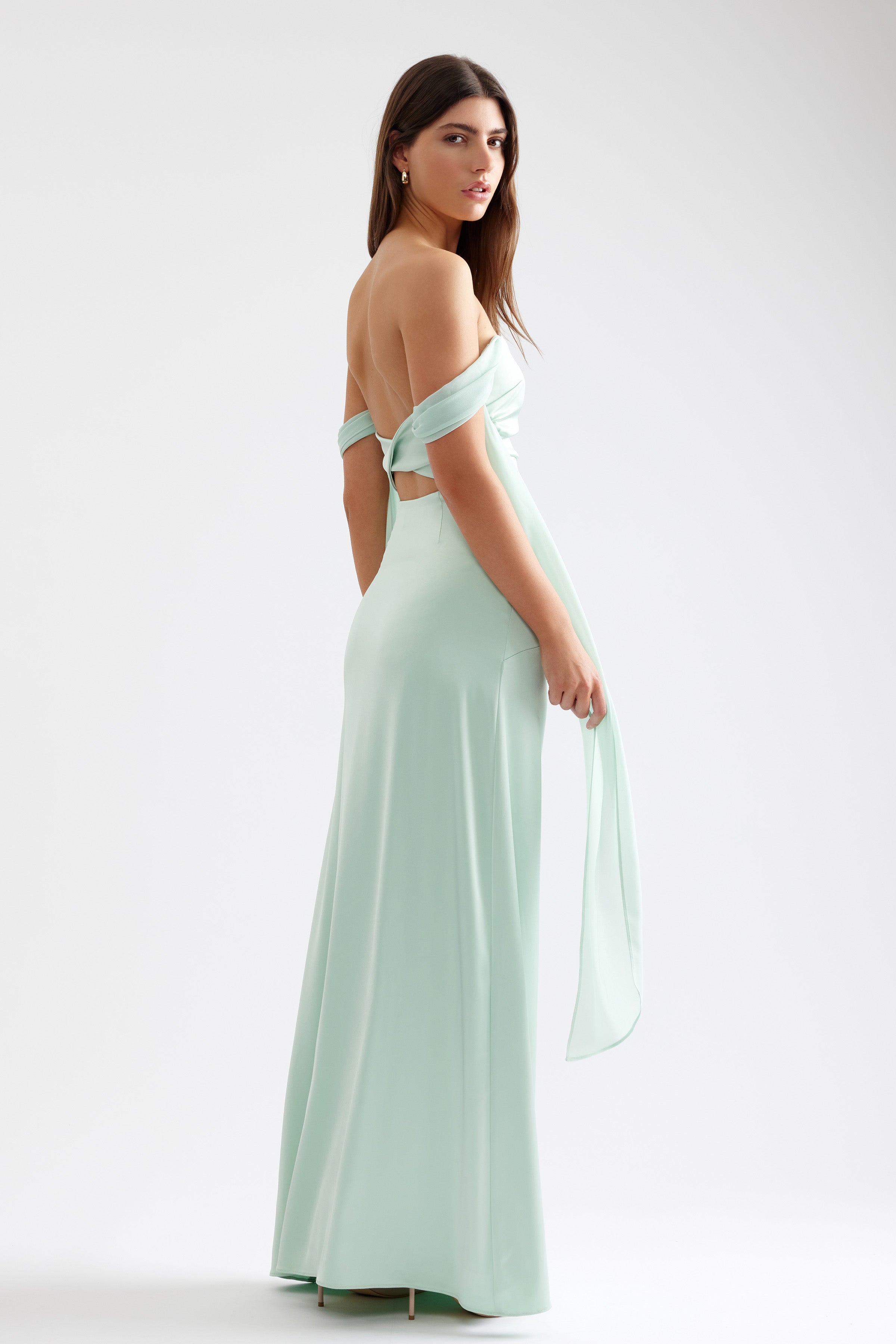 Hattie Dress elegant off-shoulder sleeve design with open back and flowing skirt in soft mint for formal occasions by Studio Lexi