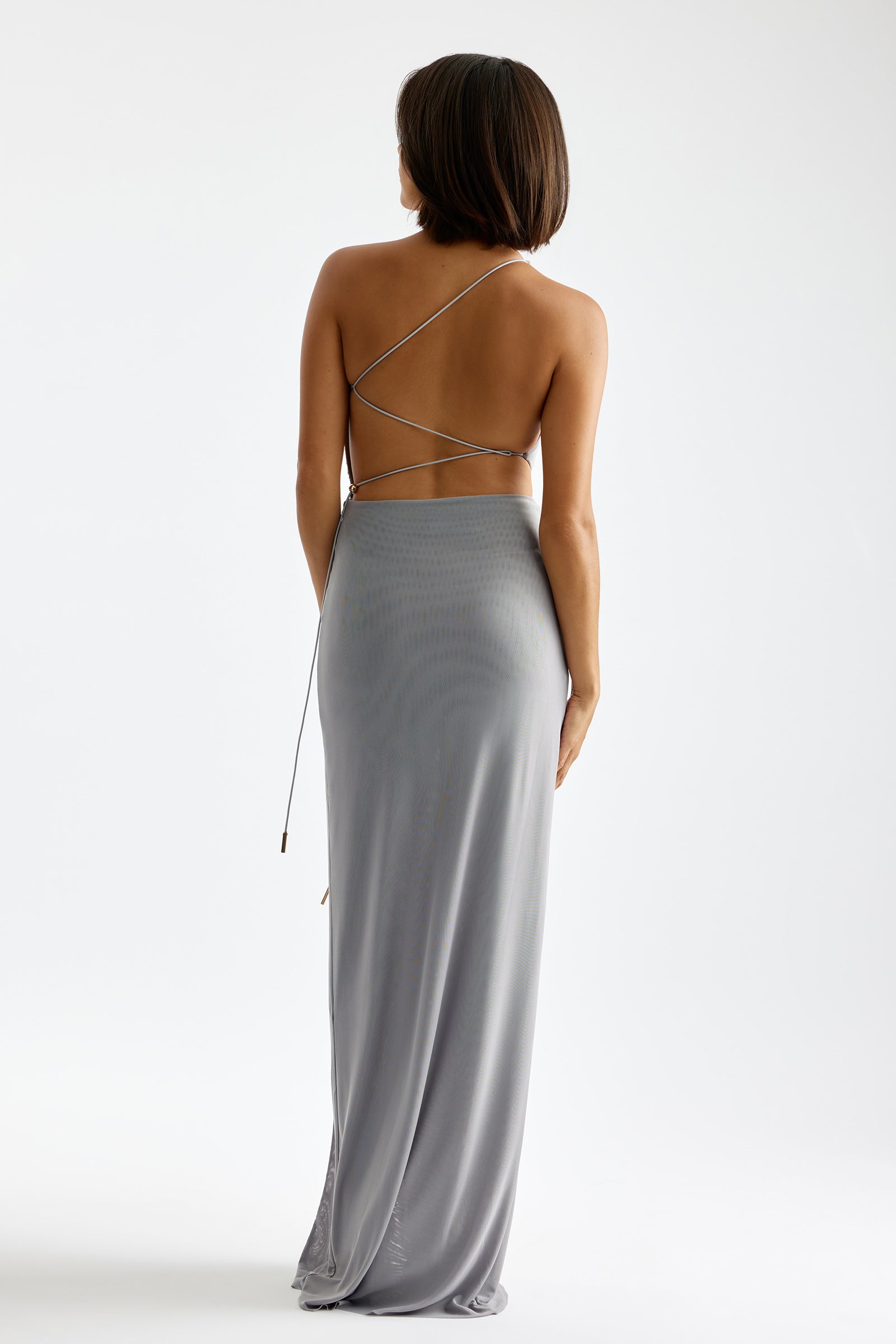 Havana Dress featuring an open back with delicate thin straps and flowing silhouette in light grey by Studio Lexi