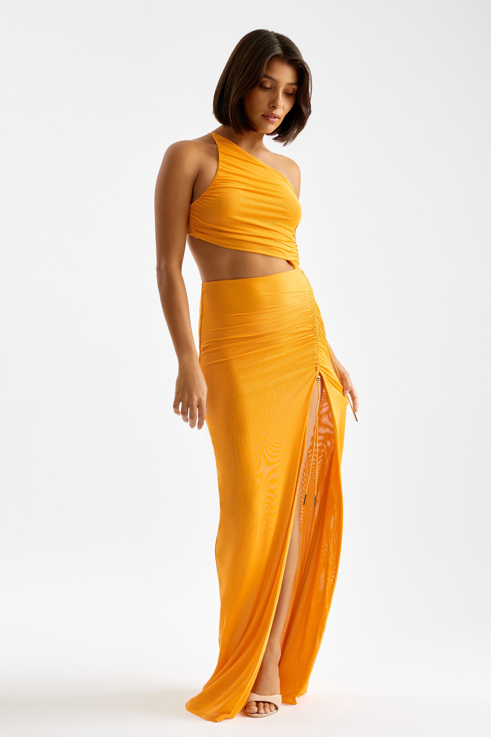 Havana Dress backless one-shoulder design with high side split in vibrant orange for cocktail and formal events by Studio Lexi