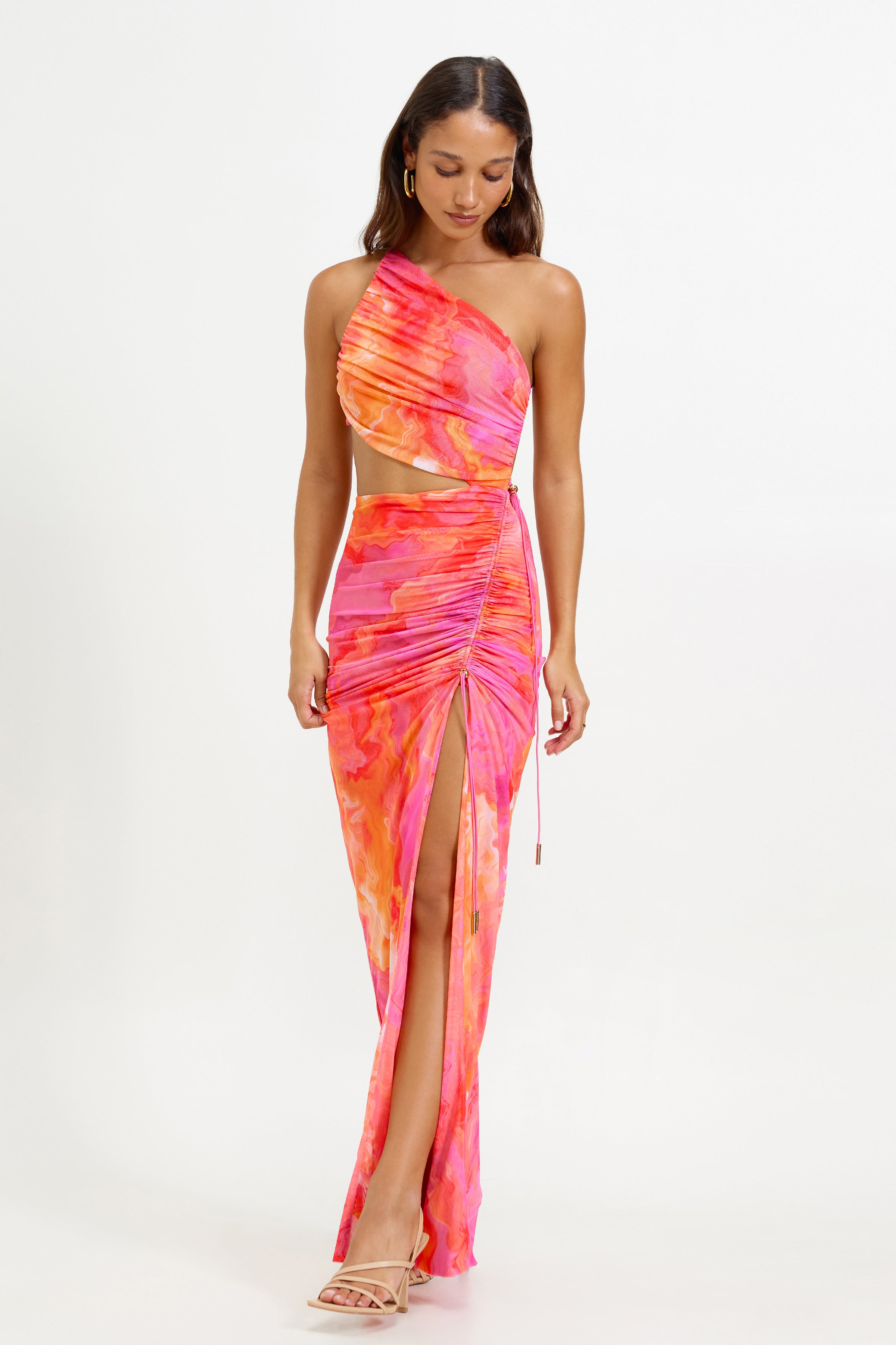 Havana Dress featuring a printed vibrant pink and orange fabric with ruched side split and cutout for formal and party occasions