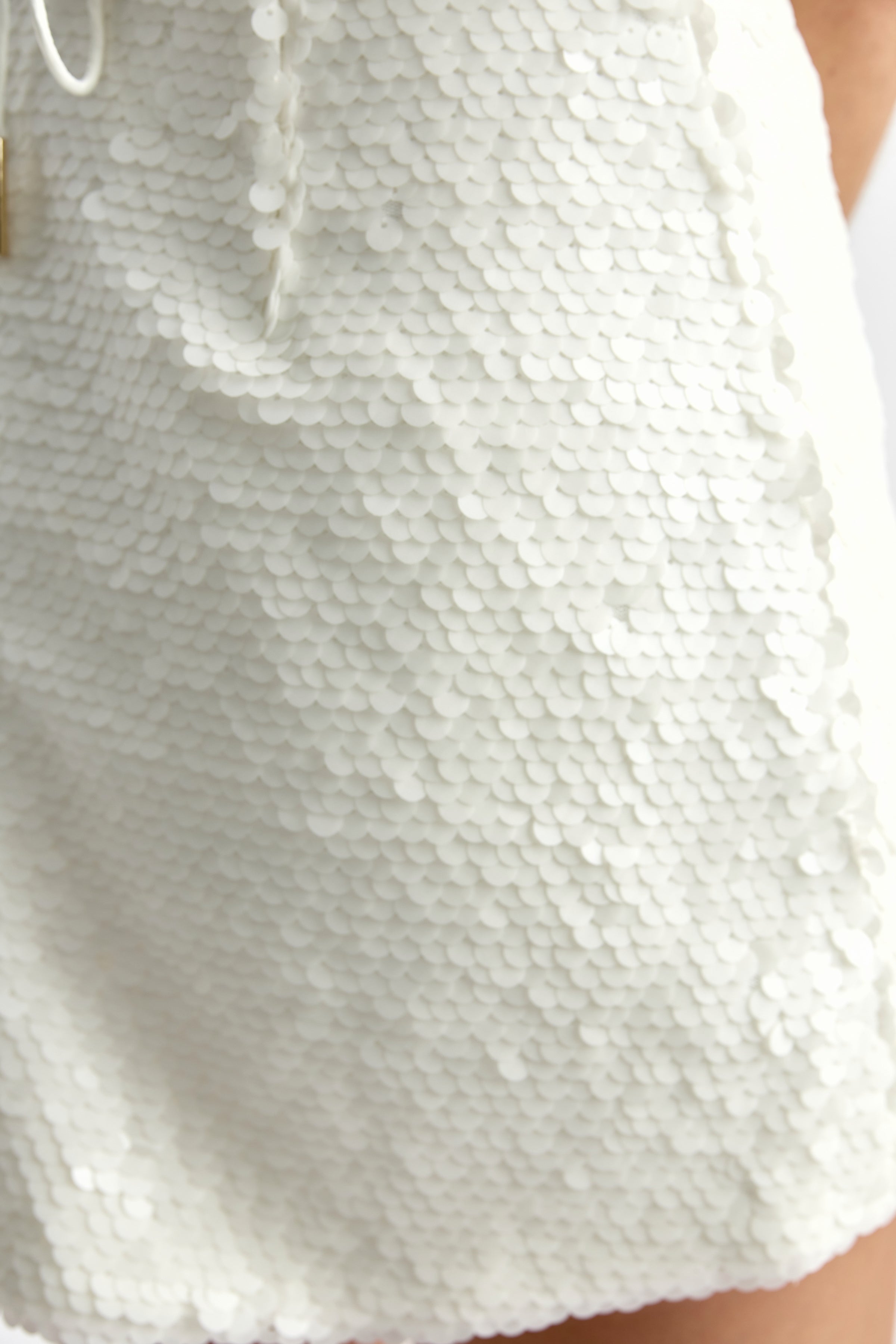 Henri Dress showcasing a textured ivory sequin fabric with a luxurious finish for elegant occasion wear by Studio Lexi