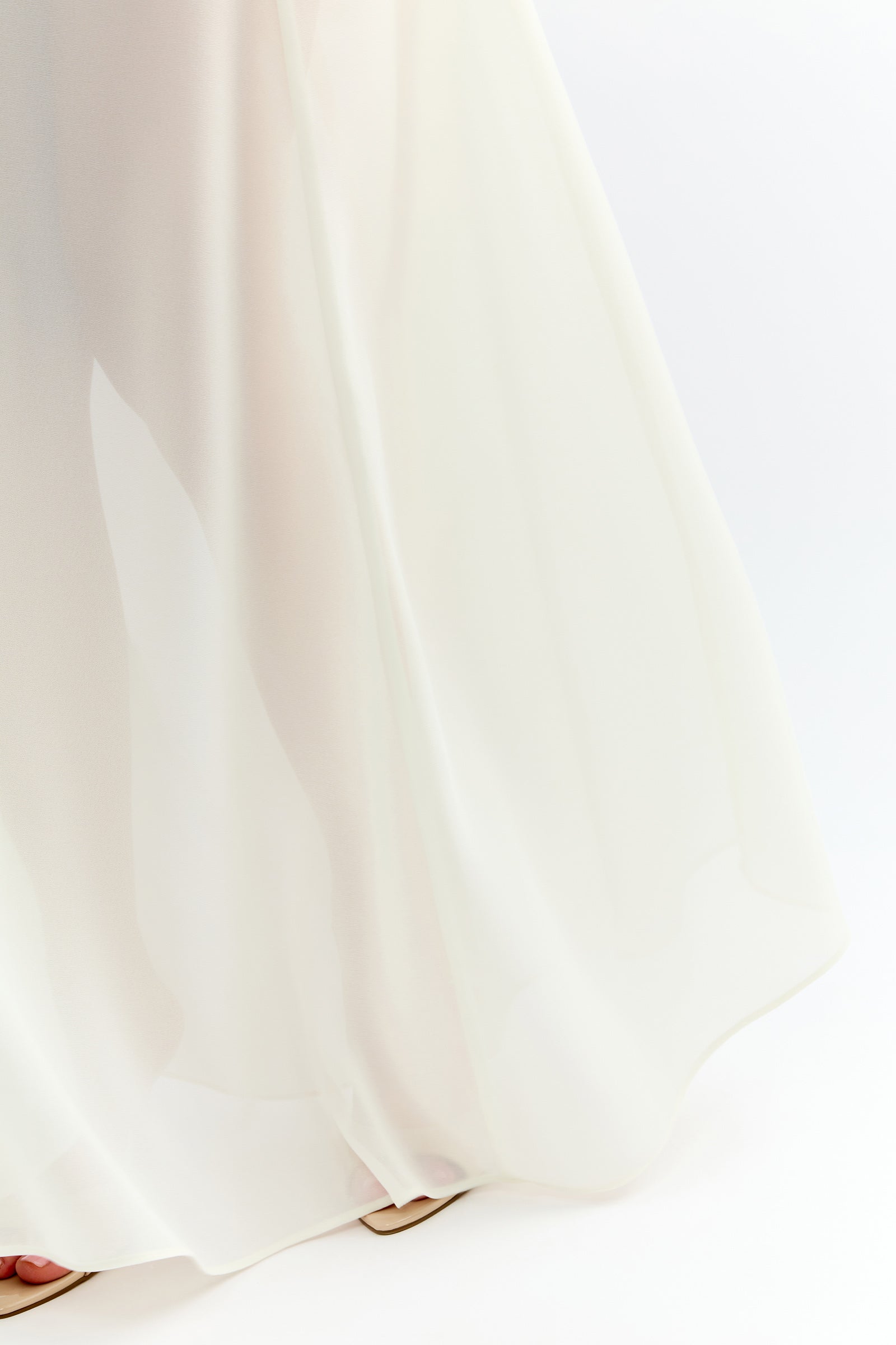 Imani Dress featuring flowing skirt detail in ivory for formal and bridesmaid occasions by Studio Lexi