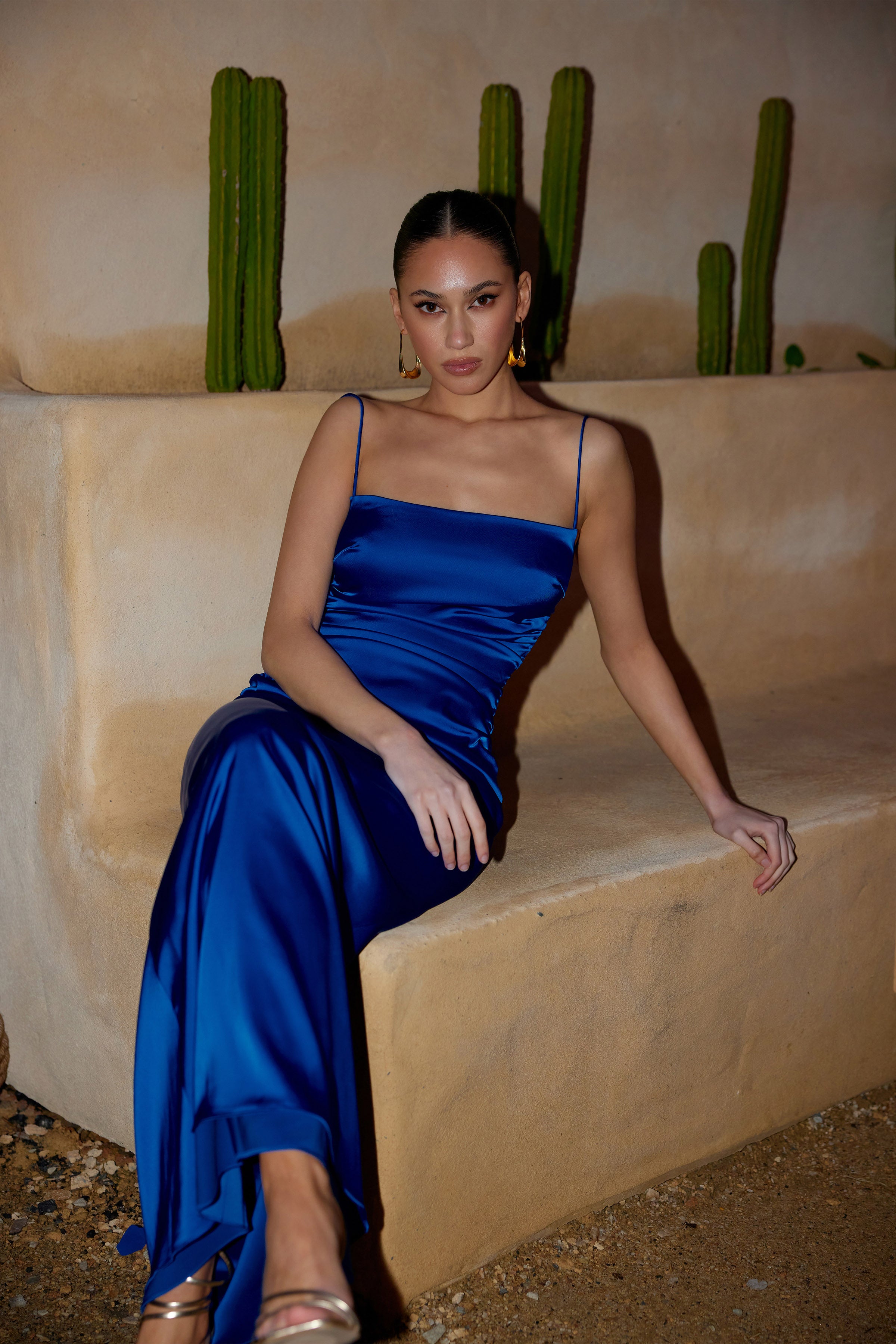 Ivy Dress featuring a sleek silhouette with thin straps in cobalt blue luxe stretch satin for formal occasions