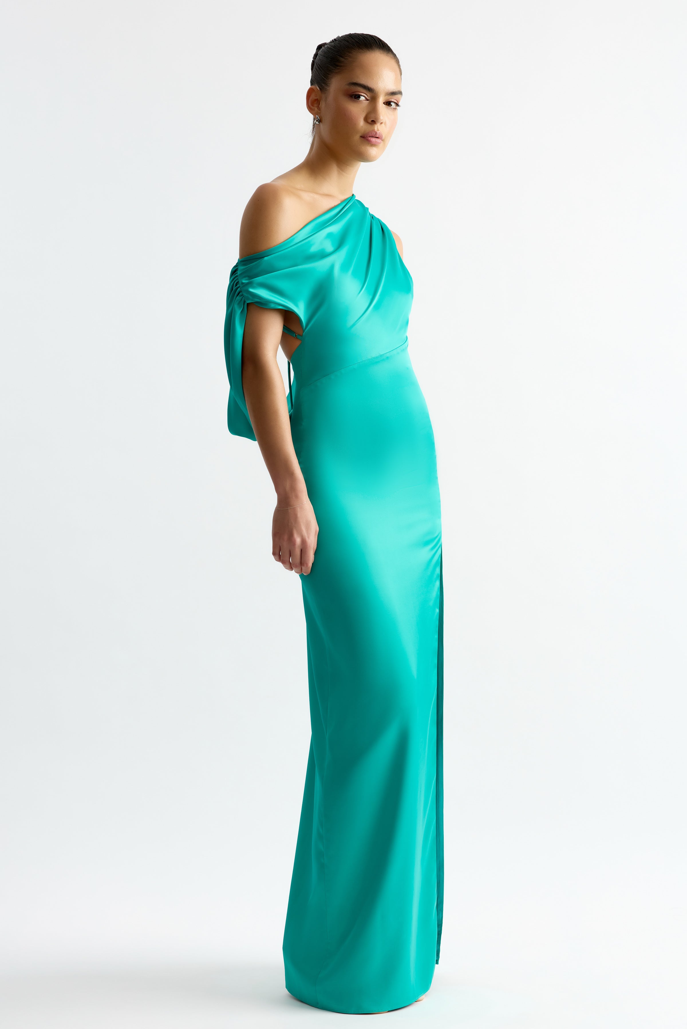 Jayne Dress fitted silhouette with one-shoulder design and side slit in vibrant jade for evening and formal events
