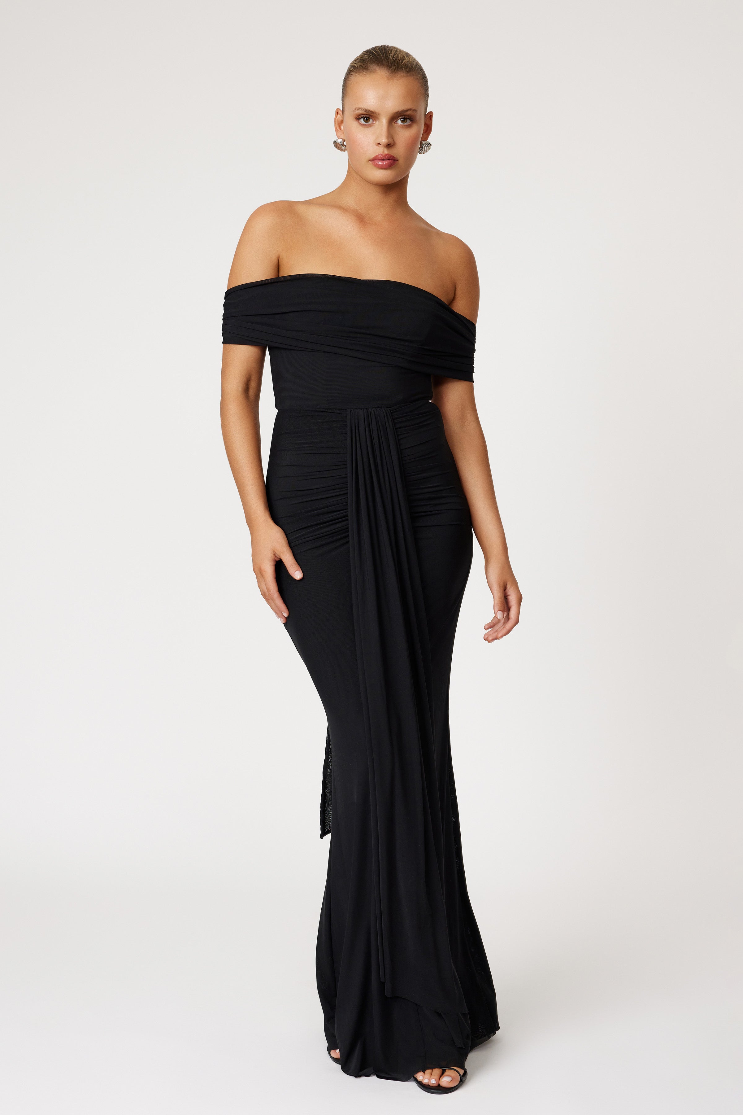 Jora Dress elegant off-shoulder silhouette with ruched detailing and draped skirt in black for formal black tie events by Studio Lexi