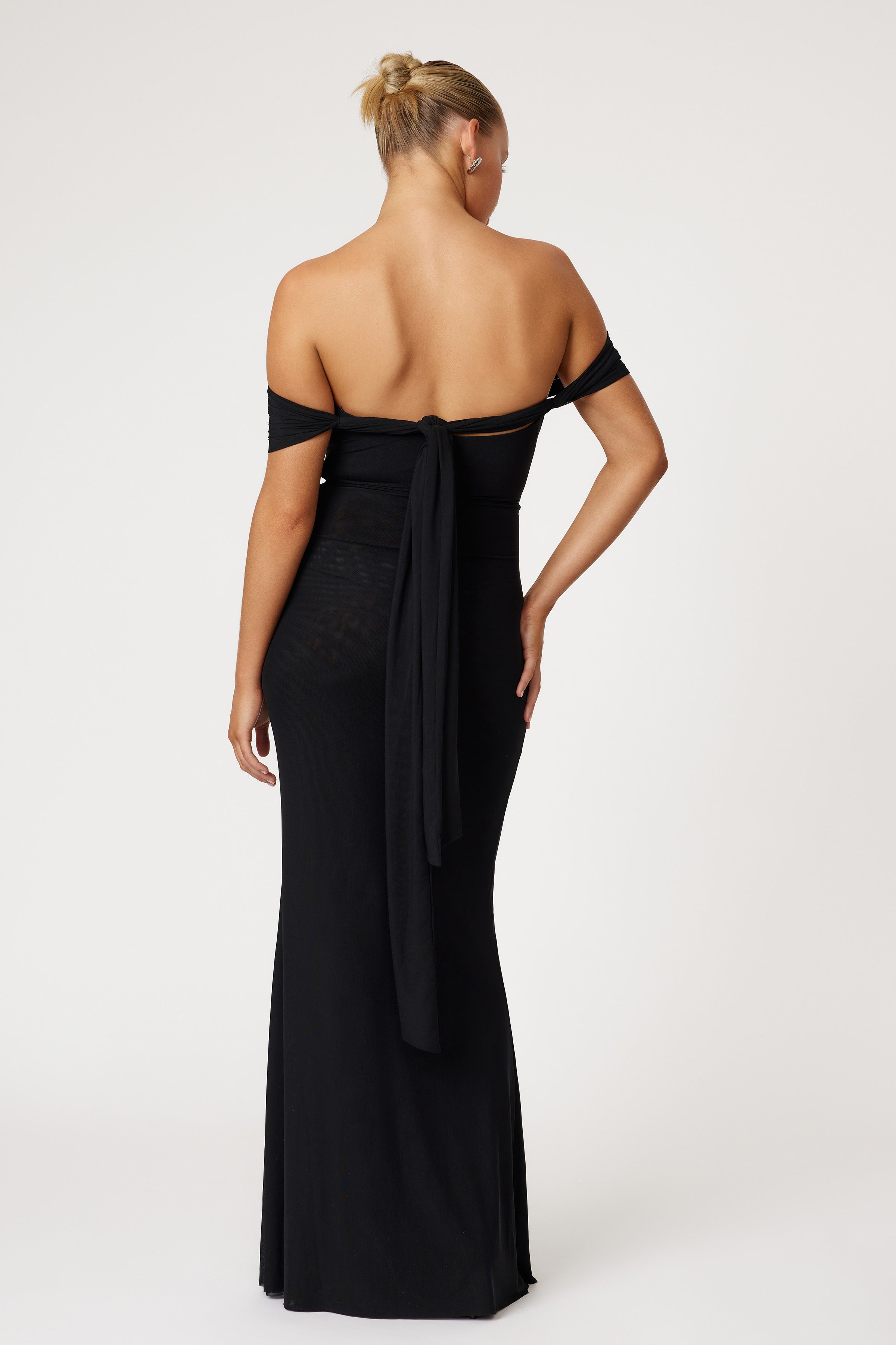 Jora Dress elegant off-shoulder silhouette with back tie detail in black for formal black tie and wedding guest events by Studio Lexi