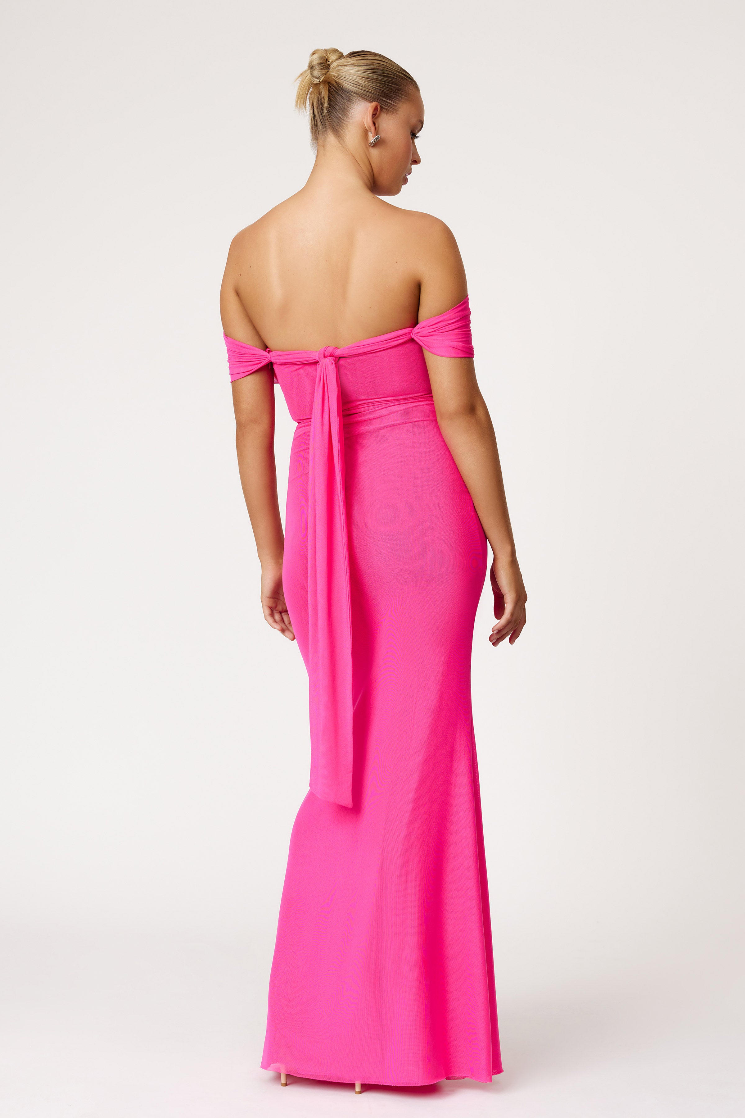 Jora Dress off-shoulder design with back tie and streamlined silhouette in vibrant raspberry for formal and wedding guest events by Studio Lexi