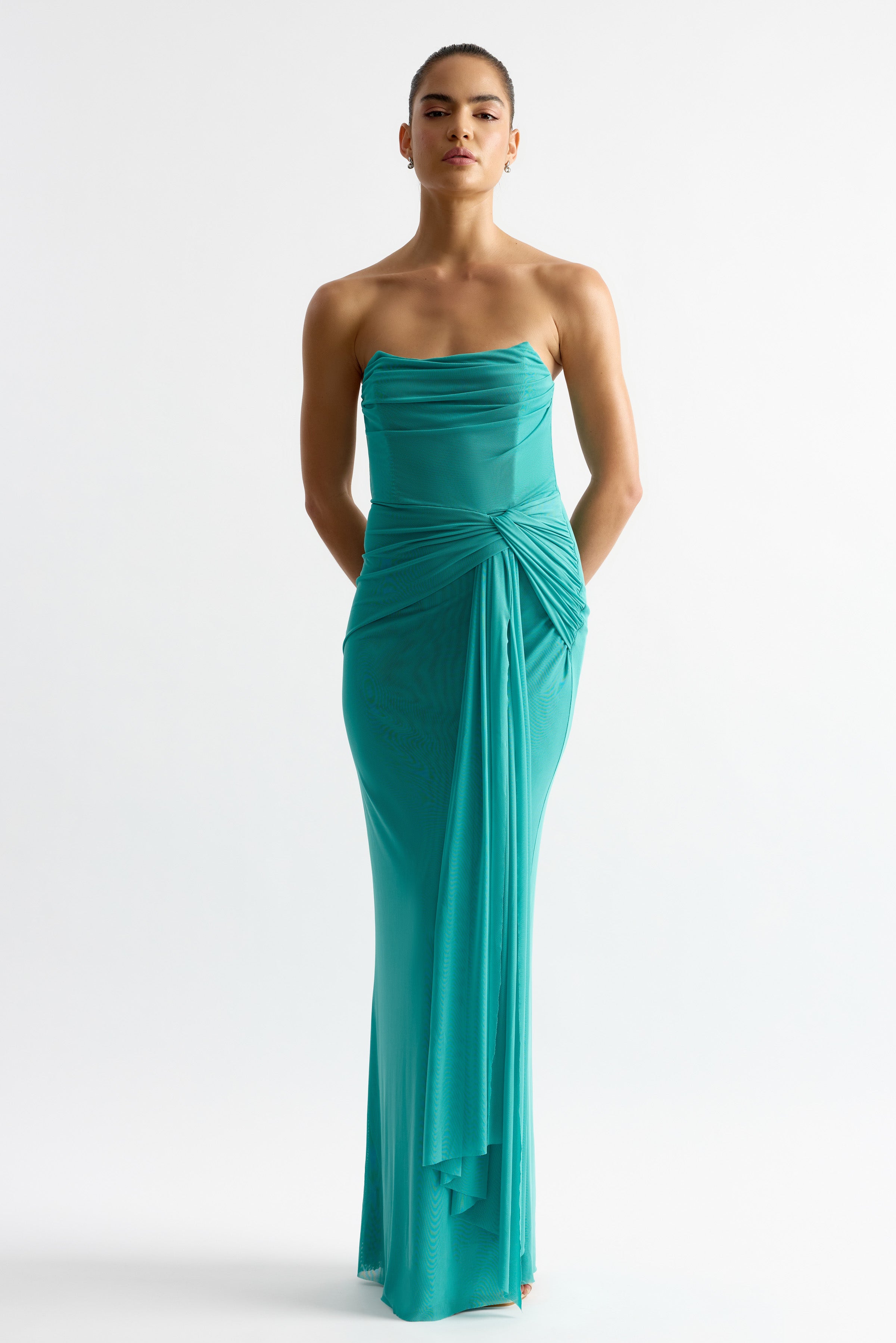 Jules Dress featuring a fitted strapless silhouette with gathered detail and draped accent in vibrant green by Studio Lexi