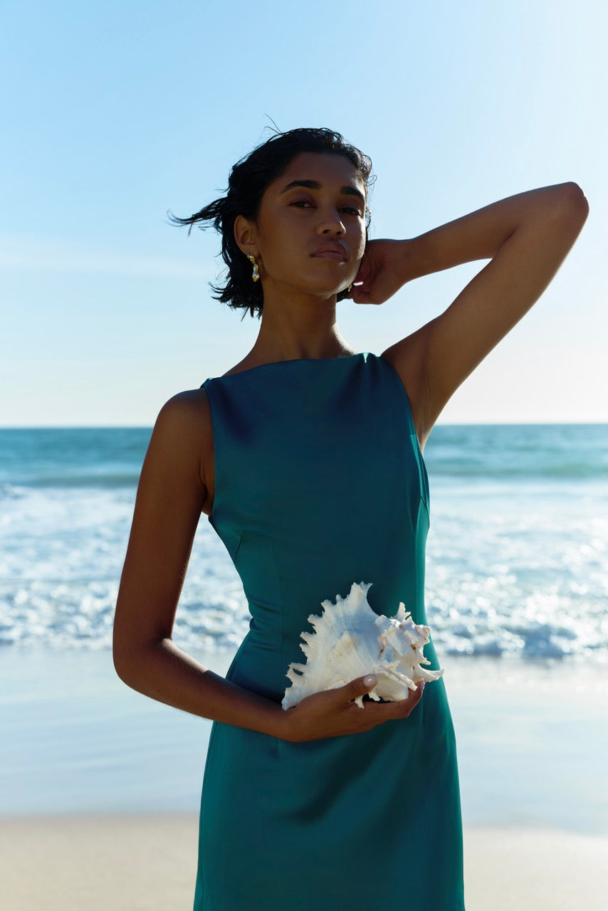 Julia Dress featuring sleek sleeveless design in emerald green with elegant fitted silhouette by Studio Lexi