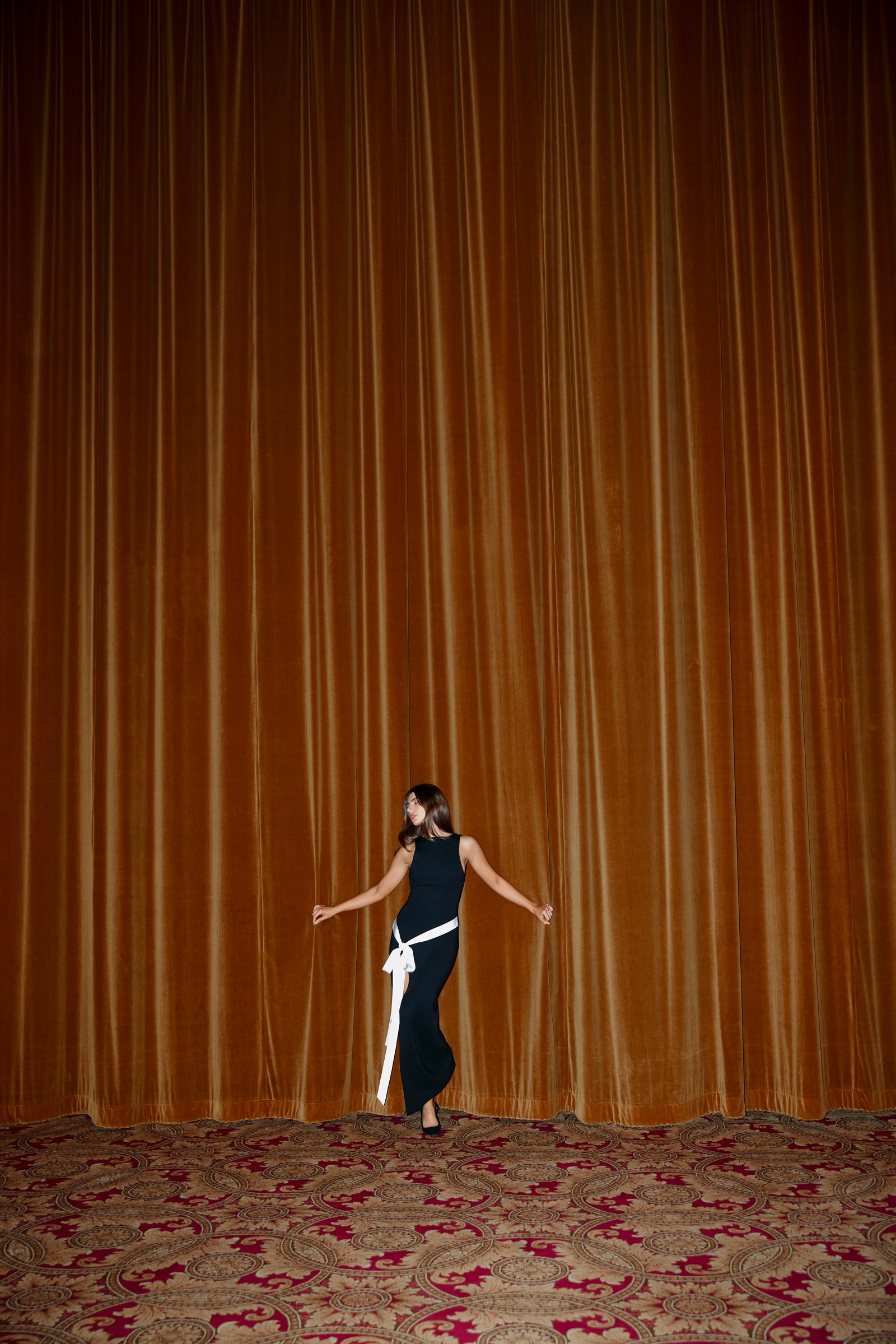 Katherine Dress fitted sleeveless gown with high side split and contrasting white sash for formal black tie occasions