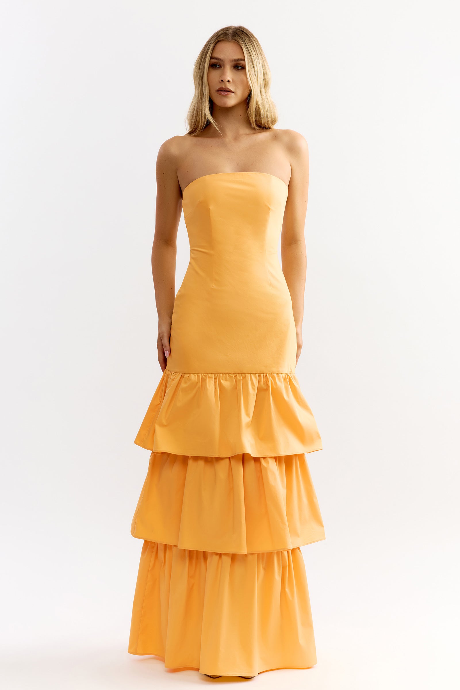 Katy Dress featuring strapless silhouette and tiered ruffle skirt in honey yellow for formal and wedding guest by Studio Lexi