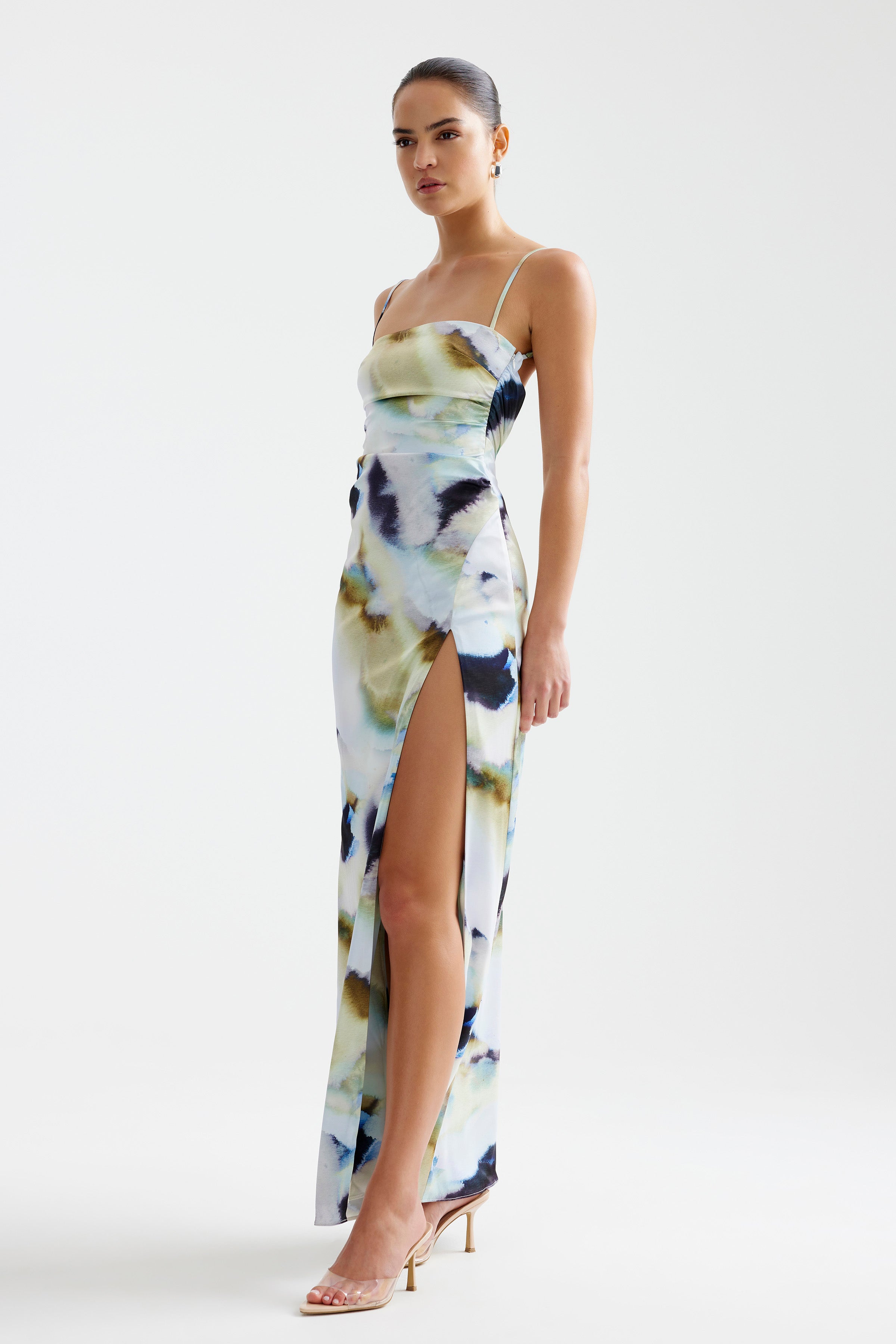 Kiri Dress featuring a slim silhouette with adjustable straps and thigh-high split in blue mineral print for formal occasions by Studio Lexi