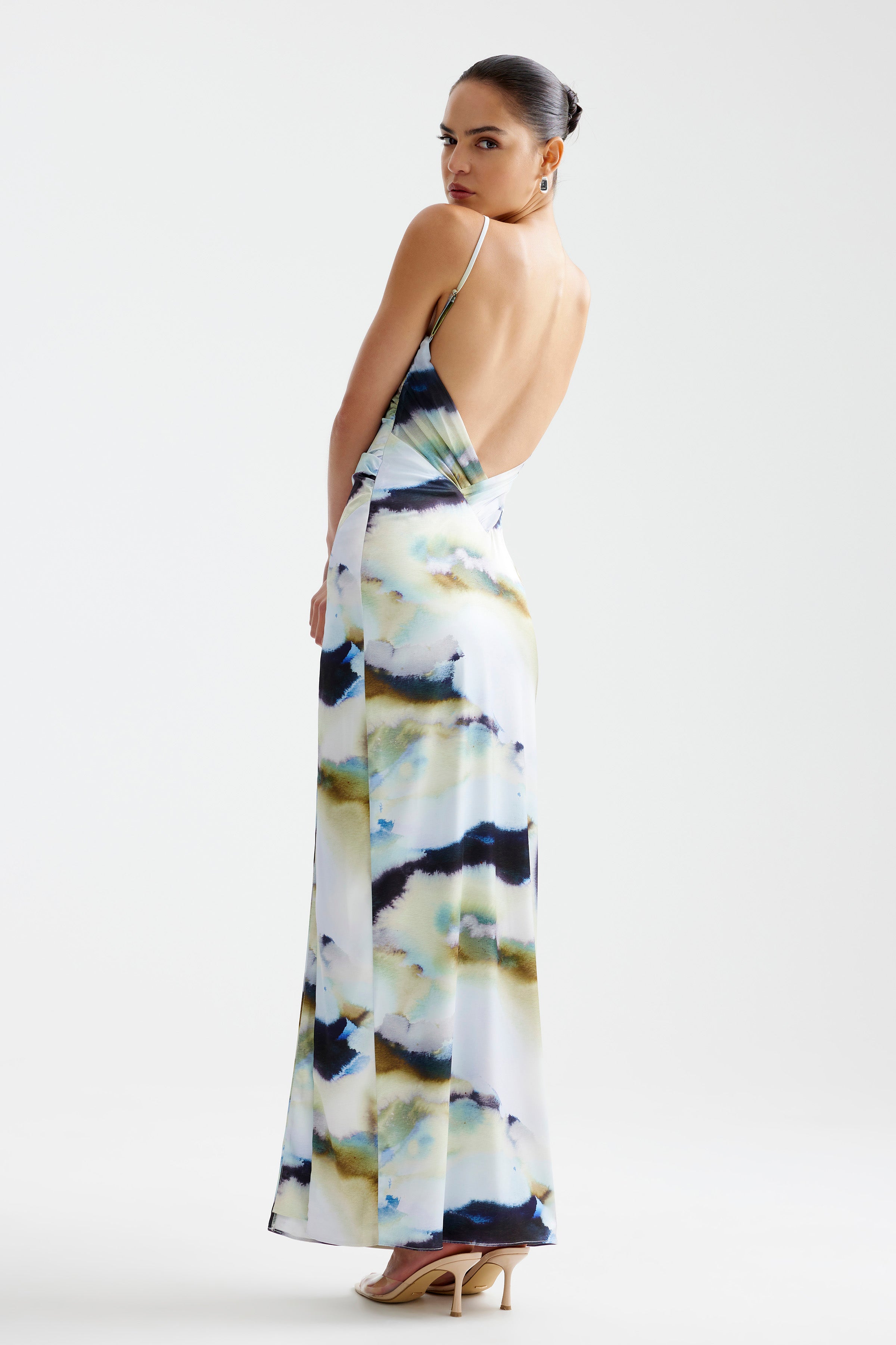 Kiri Dress featuring a backless silhouette with adjustable straps in blue mineral print for formal occasions by Studio Lexi