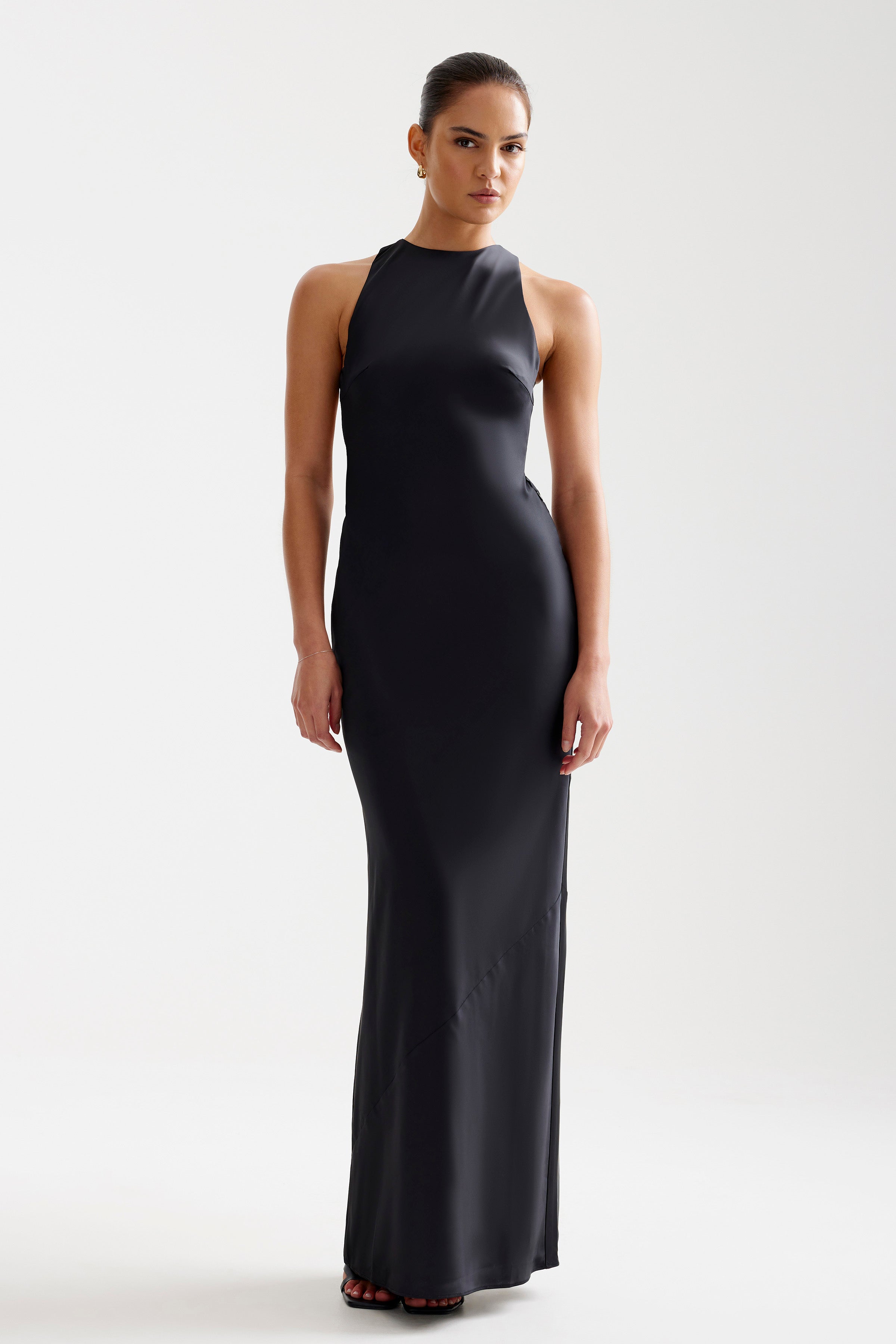 Liora Dress sleek high-neck silhouette with a backless design in elegant black for formal and cocktail occasions