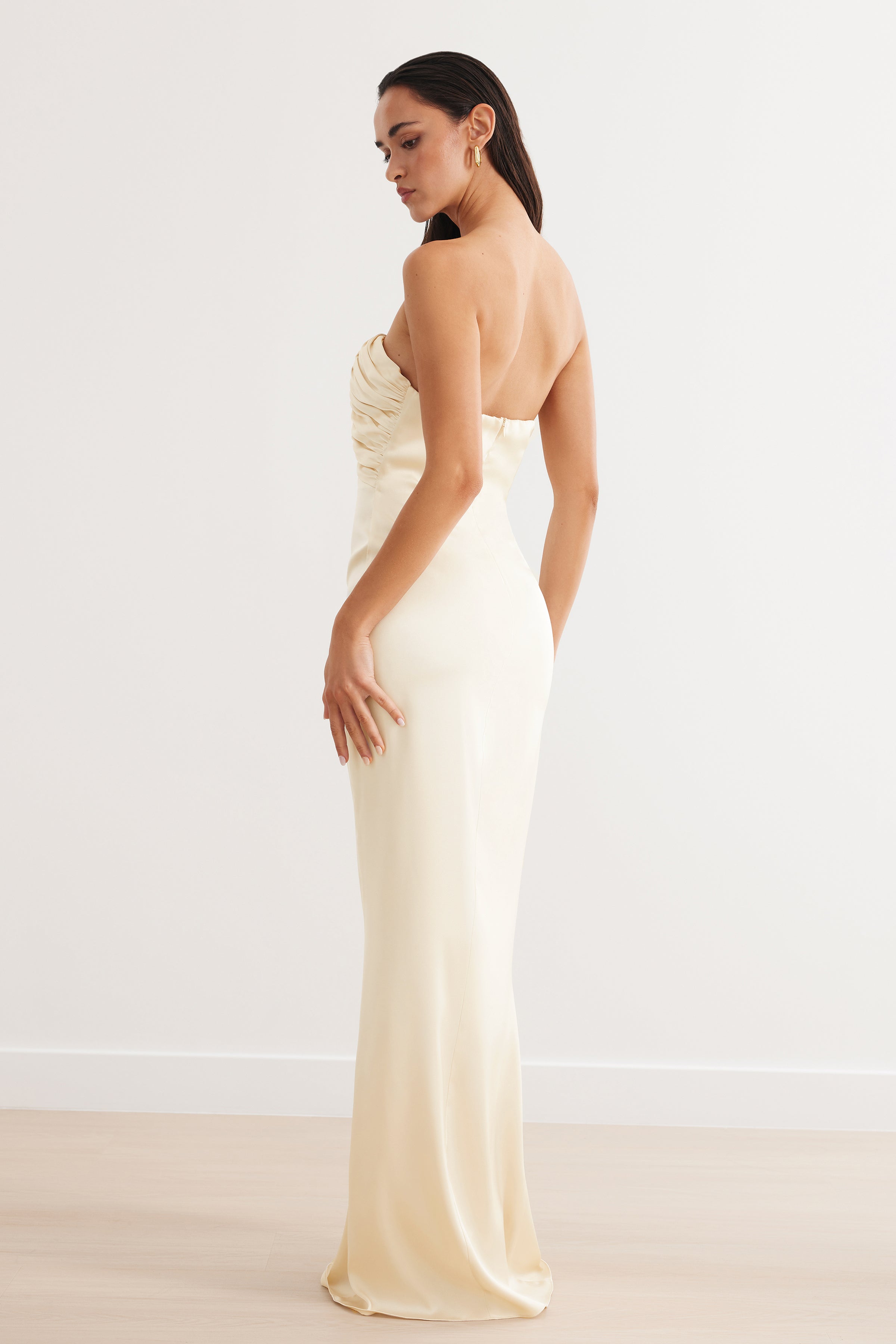 Magnolia Dress featuring strapless ruched bodice and backless silhouette in cream satin for formal black tie events