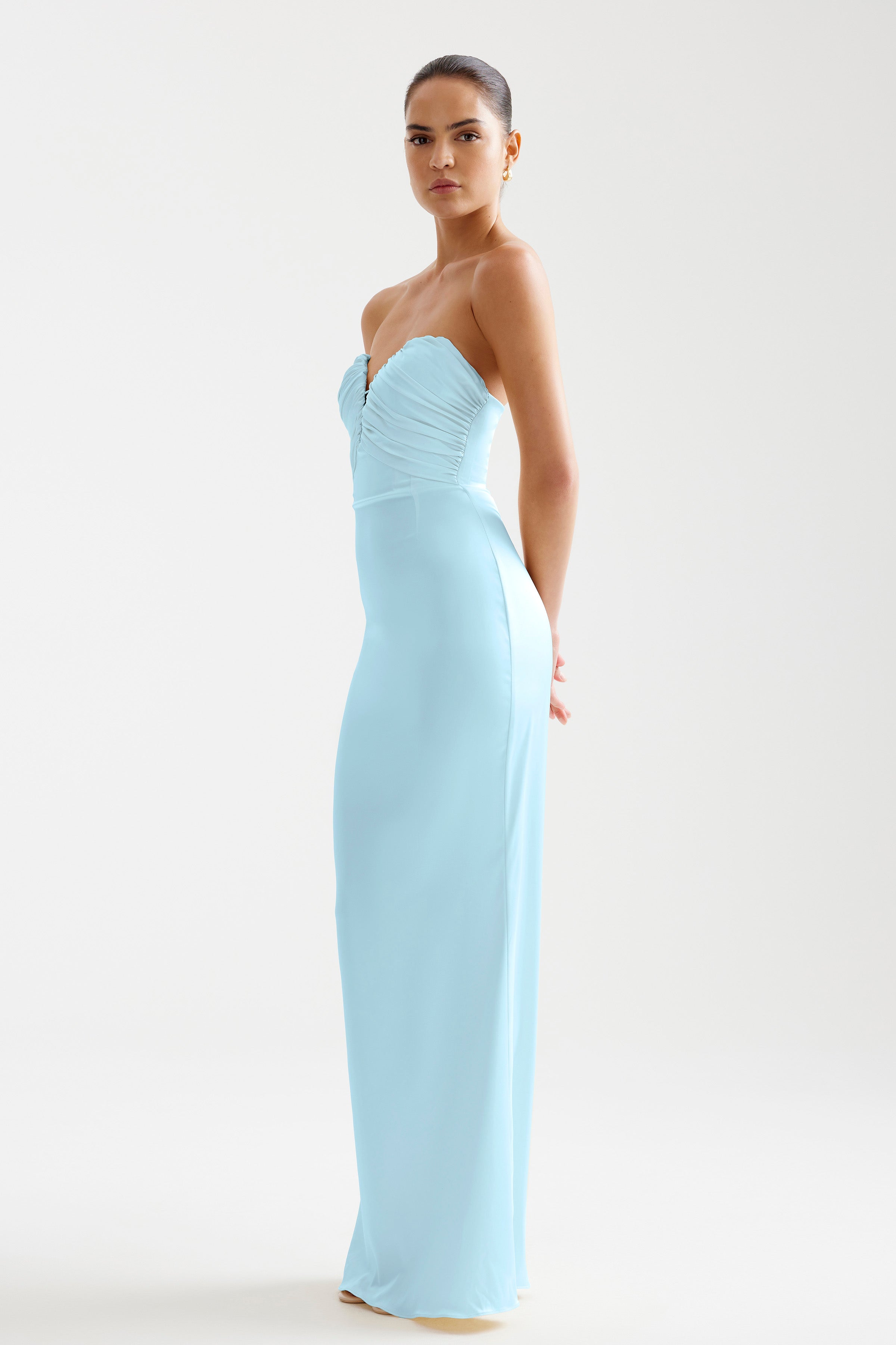Magnolia Dress featuring a strapless, ruched bodice and sleek silhouette in glacier blue for formal occasions by Studio Lexi