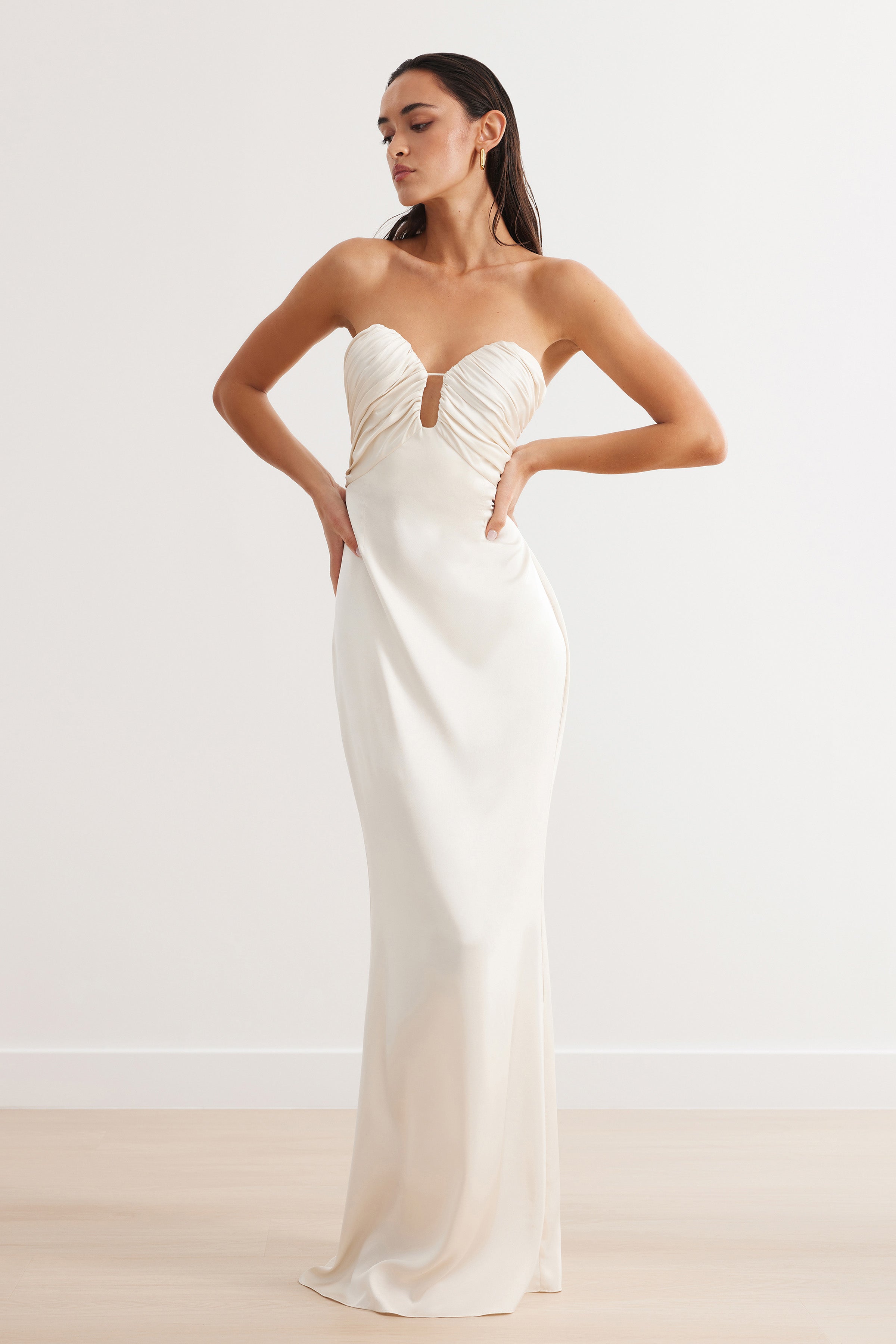 Magnolia Dress featuring a strapless ruched bust and a sleek satin silhouette in oyster for formal occasions