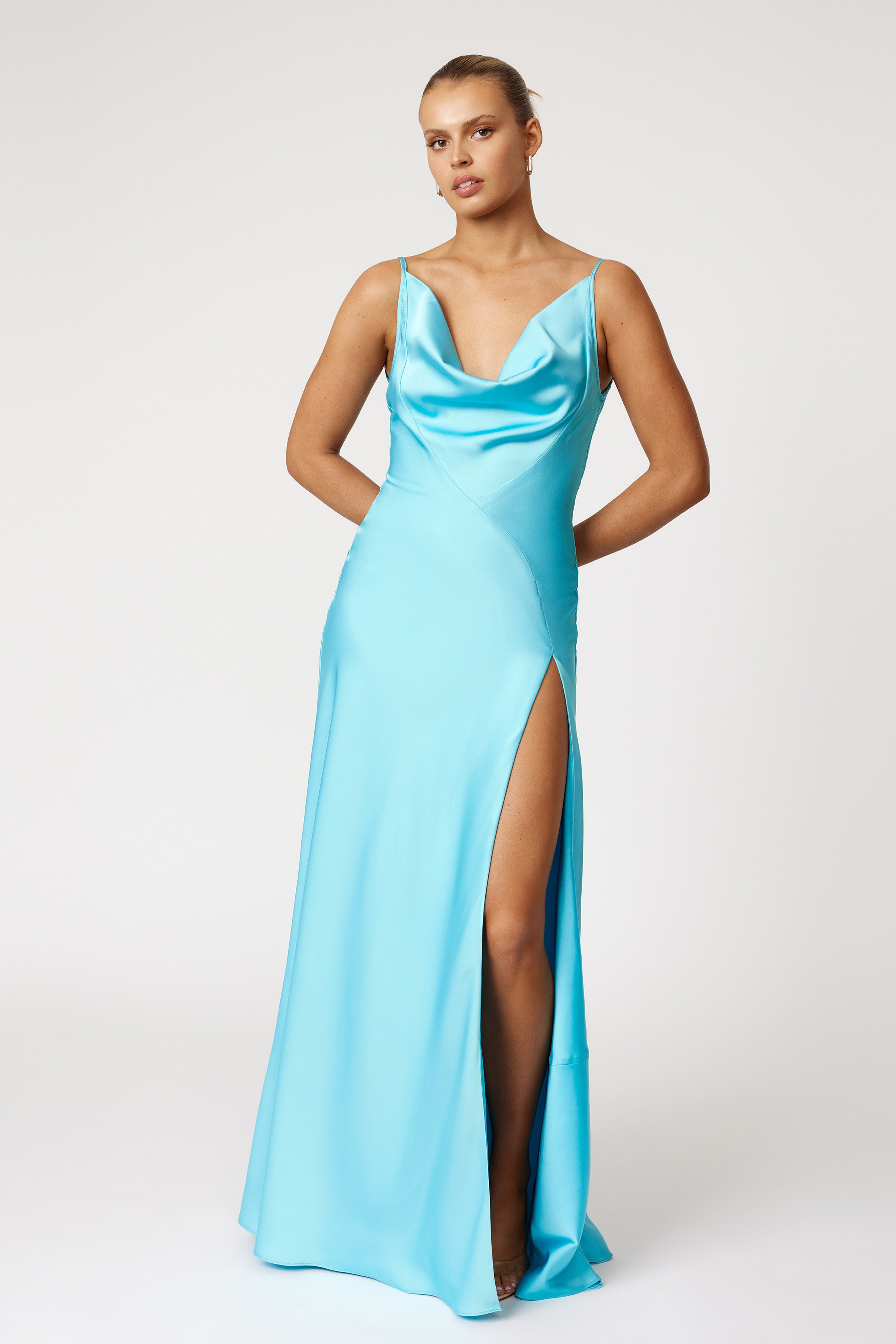 Monroe Dress with cowl neckline, slim straps, and thigh-high split in vibrant lagoon blue by Studio Lexi