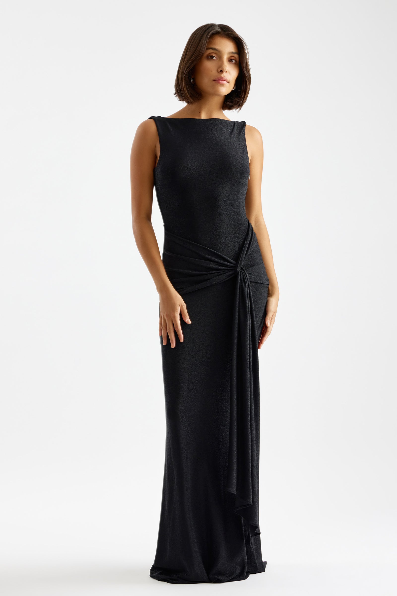 Nahla Dress black with sleeveless fitted silhouette and elegant draped knot detail for formal and evening occasions by Studio Lexi