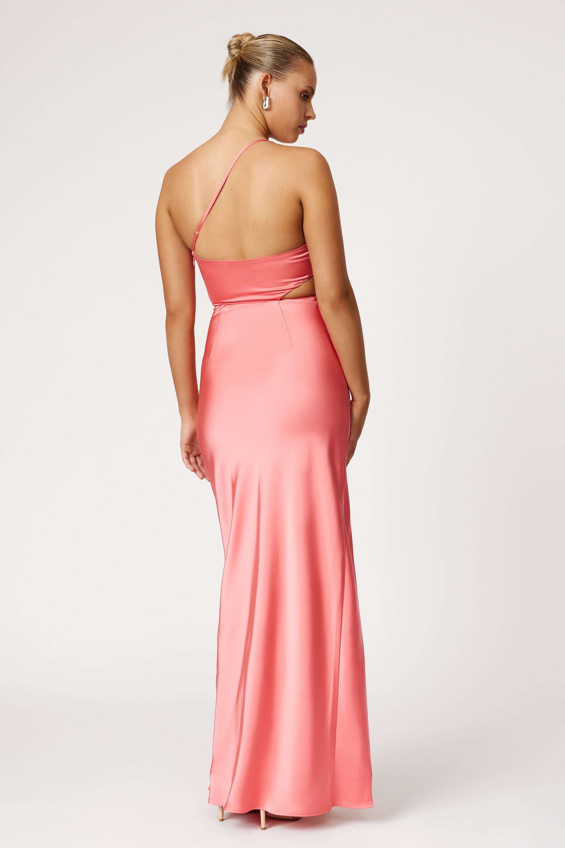 Narelle Dress featuring a sleek backless design with one strap and cutout detail in vibrant watermelon shade