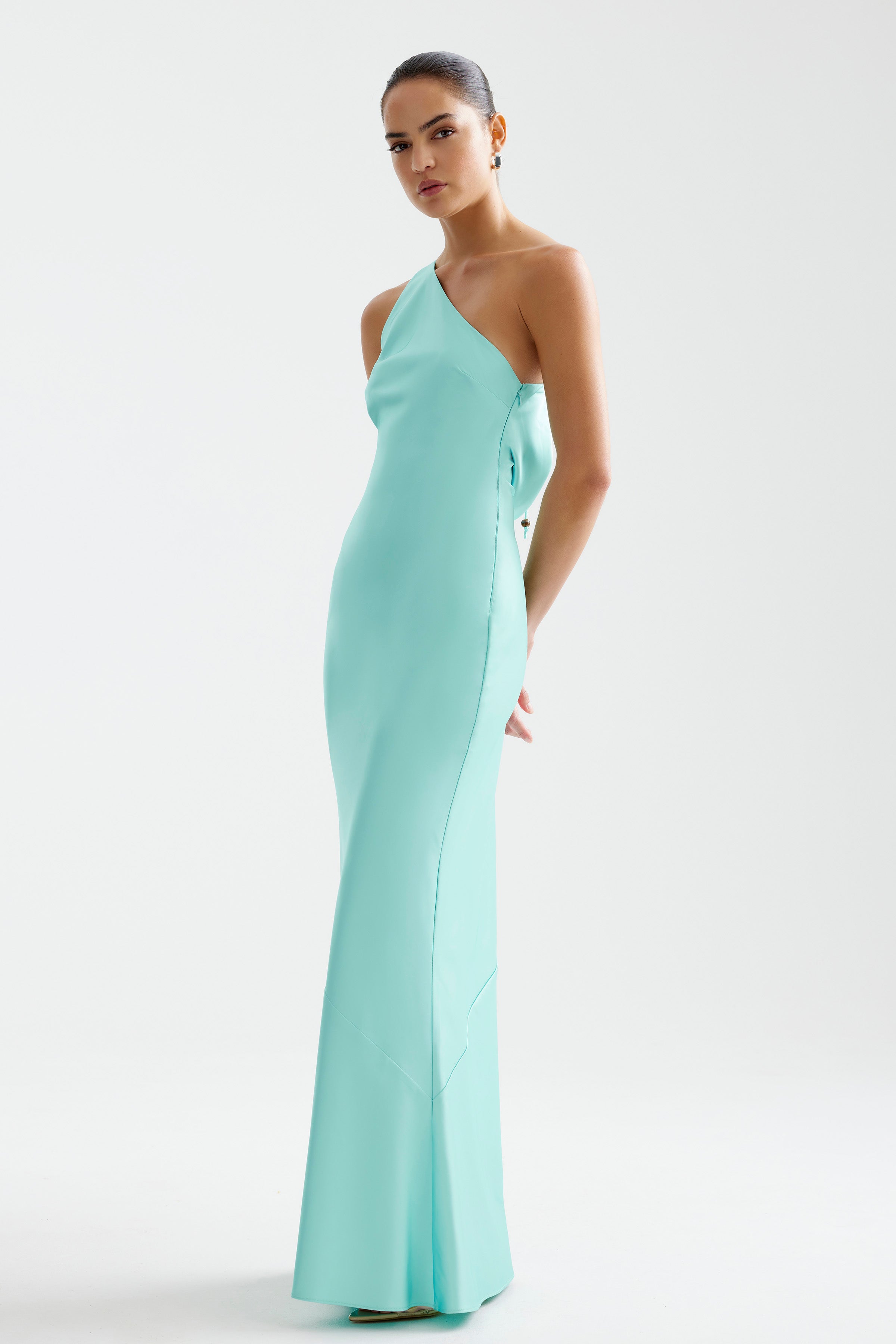 Nola Dress featuring an elegant one-shoulder silhouette with a sleek aqua design for formal and evening occasions