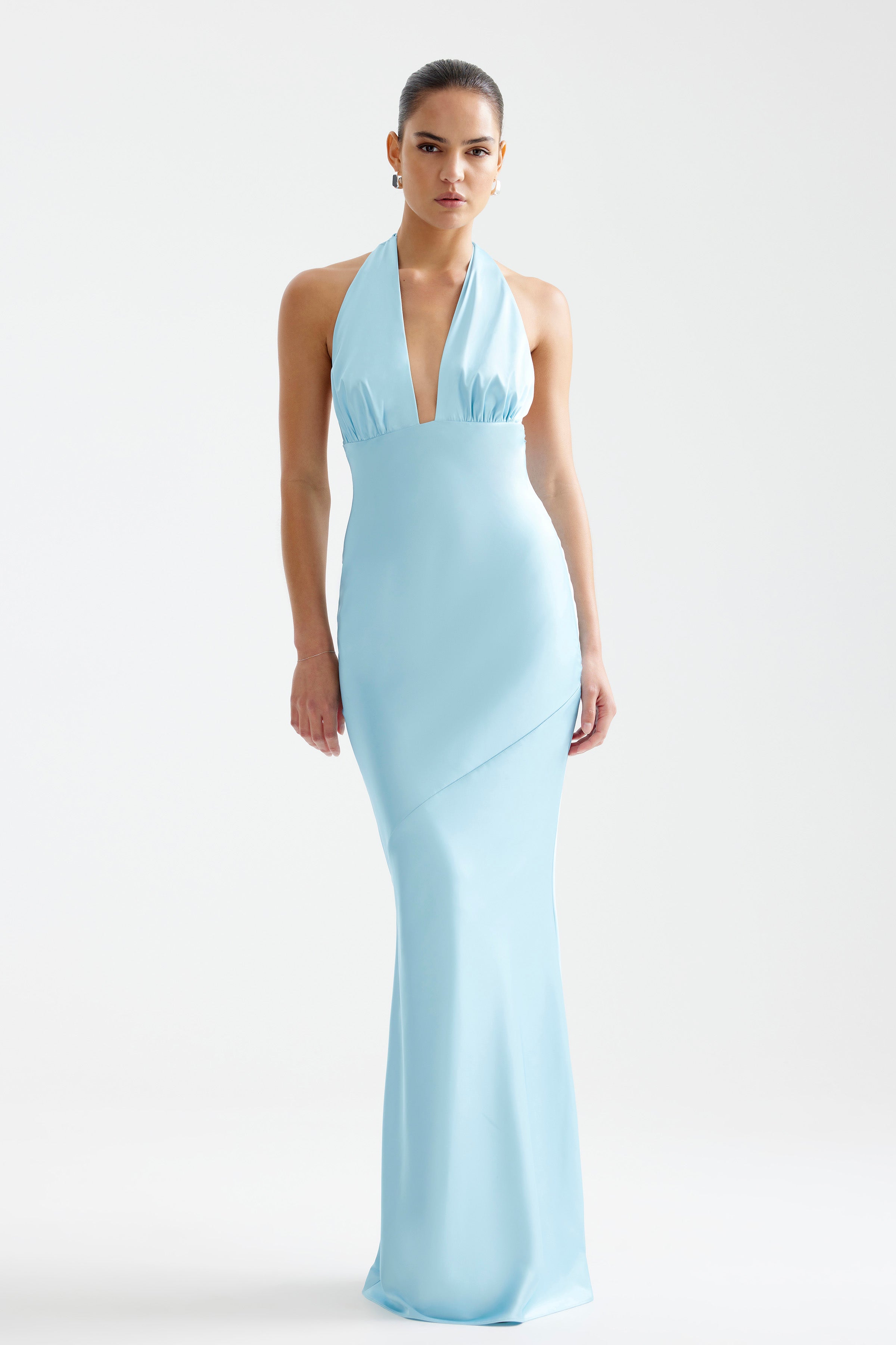 Novia Dress featuring a plunging halter neckline and sleek fitted silhouette in glacier blue for formal events