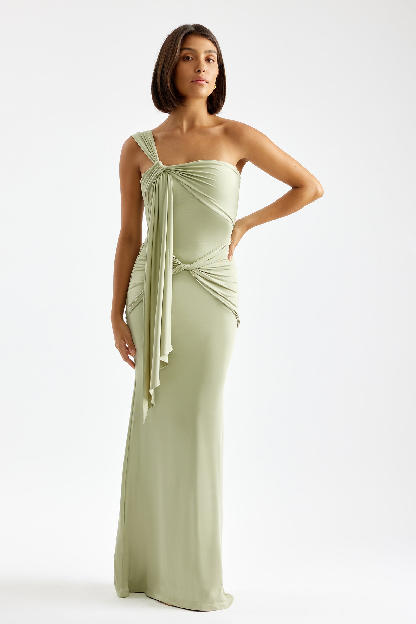 Nyla Dress single shoulder draped detail with knotted waist in sage for formal and wedding guest occasions by Studio Lexi