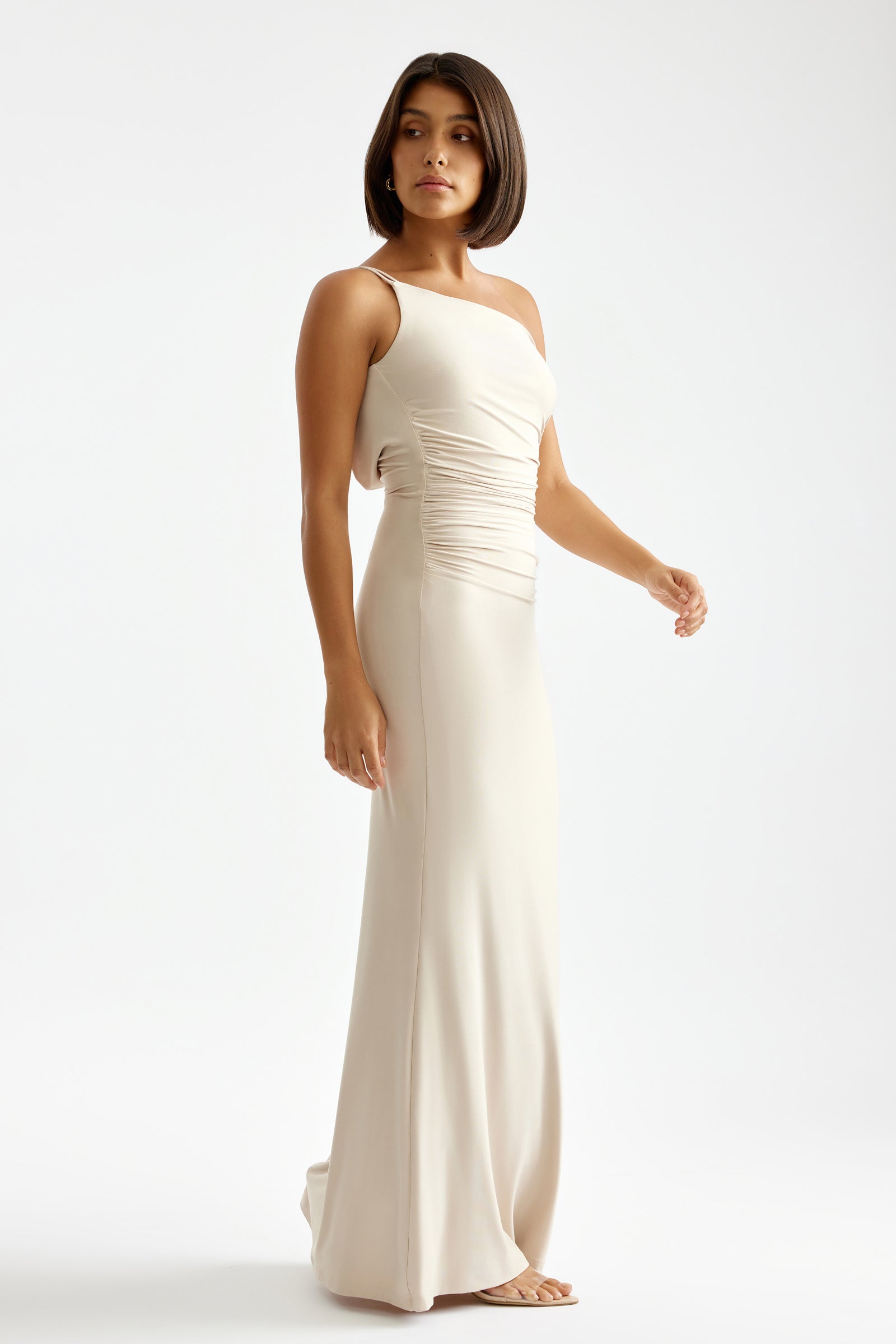 Paloma Dress featuring one-shoulder neckline and ruched waist detail in almond for formal and bridesmaid occasions by Studio Lexi